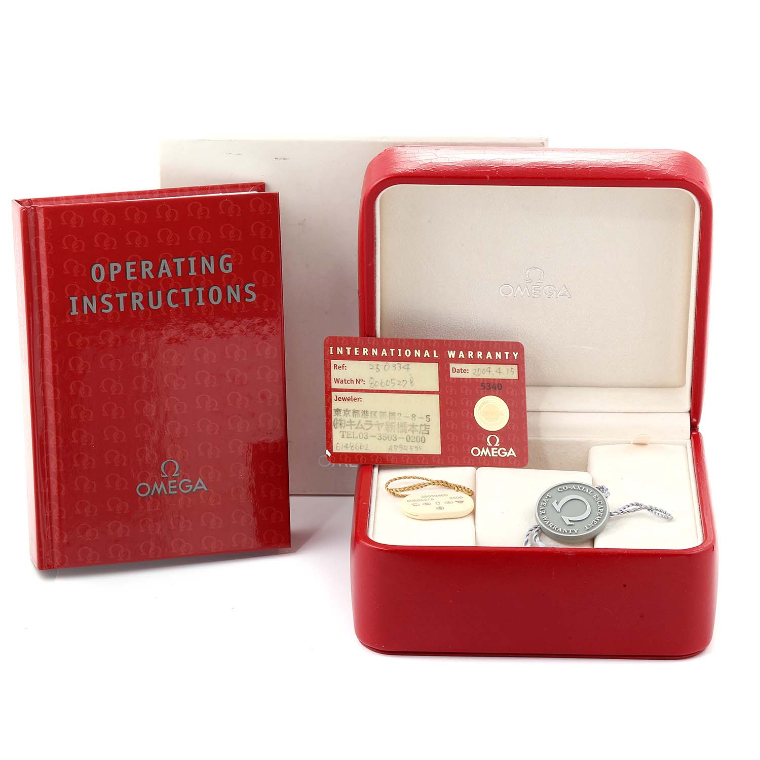 This image shows the Omega Seamaster 2503.34.00 Men
s Stainless Steel Silver Dial 2503.34.00 Men
s Stainless Steel Silver Dial watch
s box, operating instructions, warranty card, and additional tags and accessories.