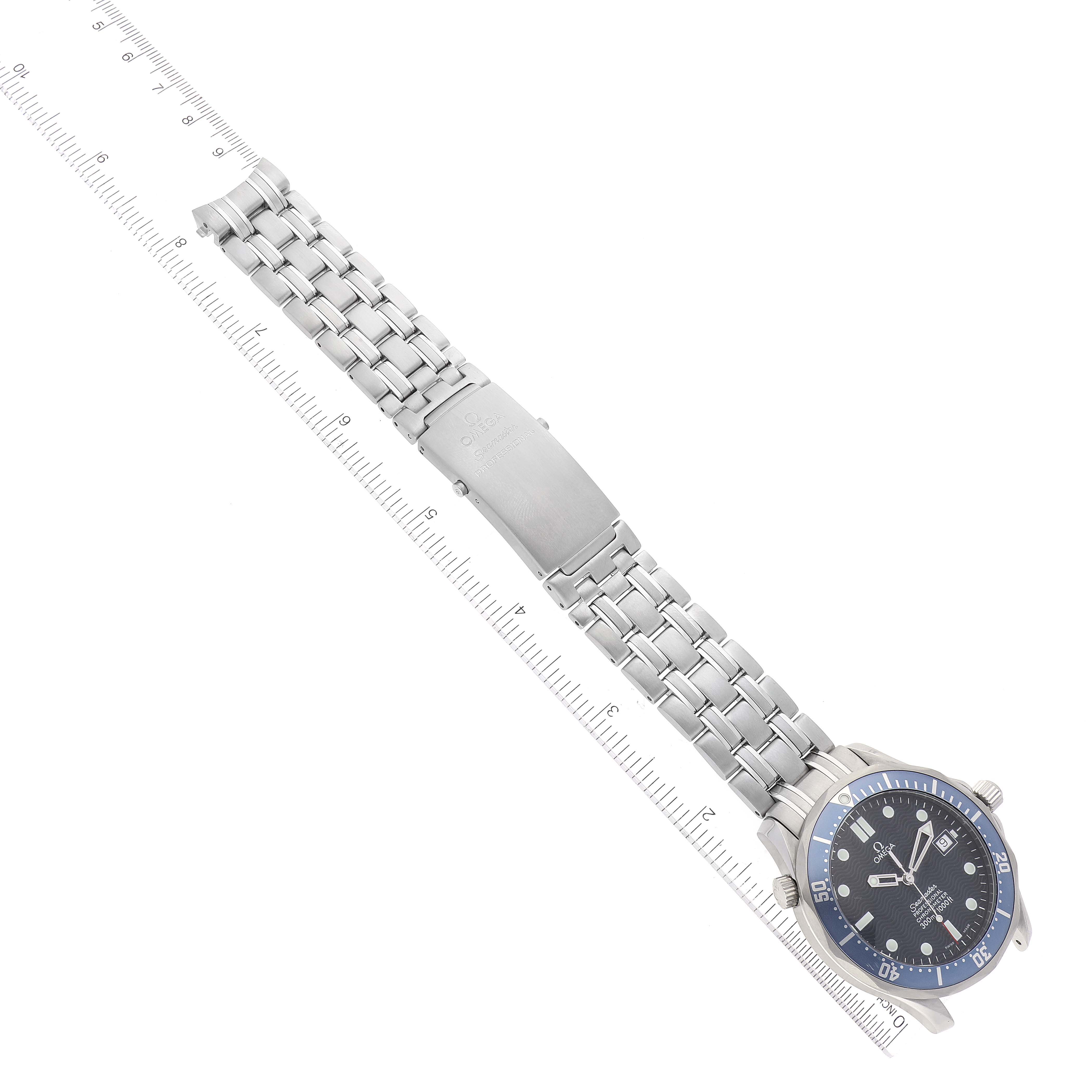 The image shows an Omega Seamaster 2531.80.00 Men's Stainless Steel Blue Dial 2531.80.00 Men's Stainless Steel Blue Dial watch laid flat with a metal bracelet, viewed from the top, alongside a ruler for scale.