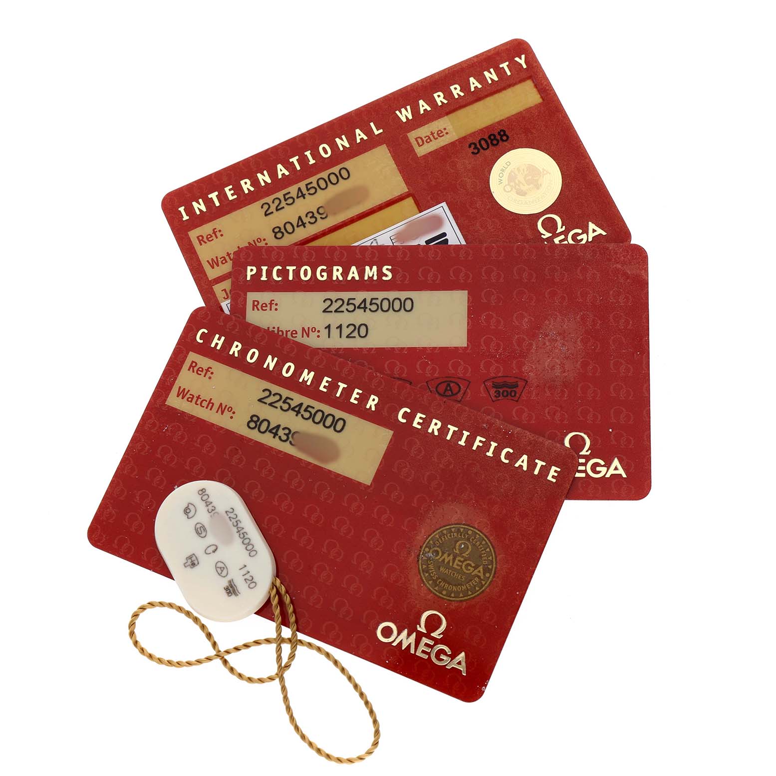 The image shows Omega Seamaster 2254.50.00 Men's Stainless Steel Black Dial watch accessories: warranty, pictogram, and chronometer cards, with a tag and string.