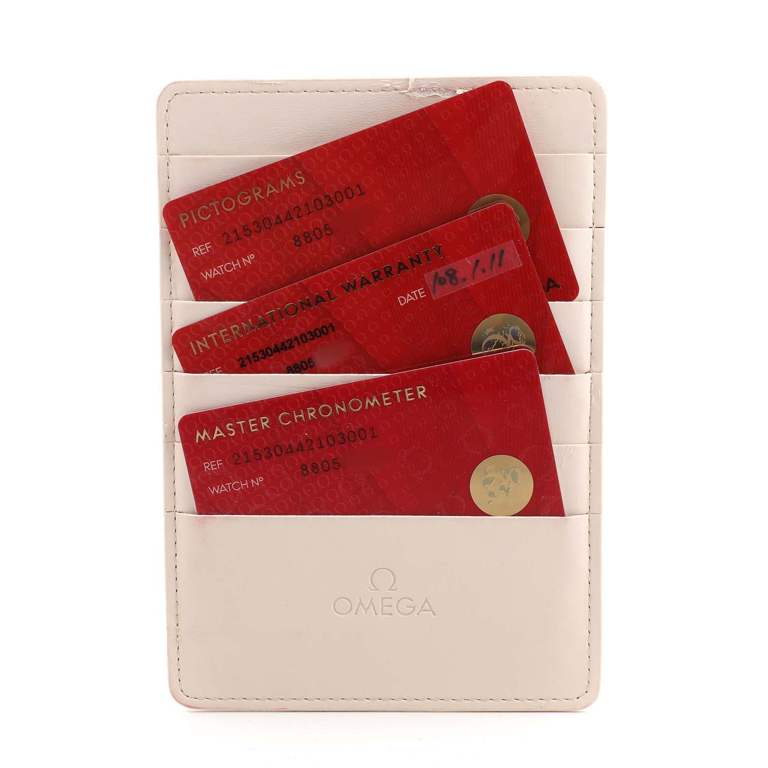 The image shows red warranty cards in a white Omega-branded cardholder for the Omega Planet Ocean 215.30.44.21.03.001 Men's Stainless Steel Blue Dial watch model.