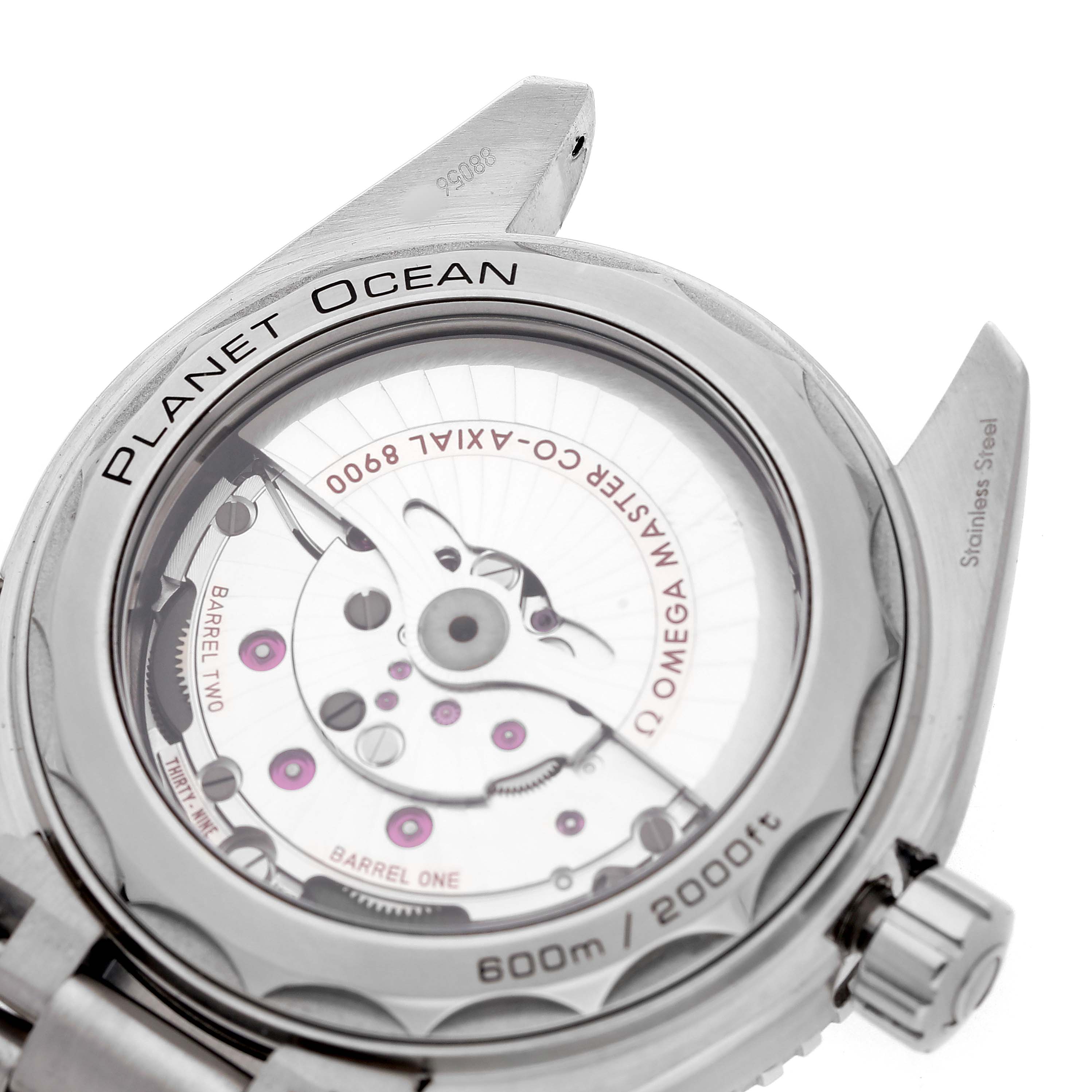 The image shows the back of the Omega Planet Ocean 215.30.44.21.03.001 Men's Stainless Steel Blue Dial watch, highlighting the movement and the transparent case back.