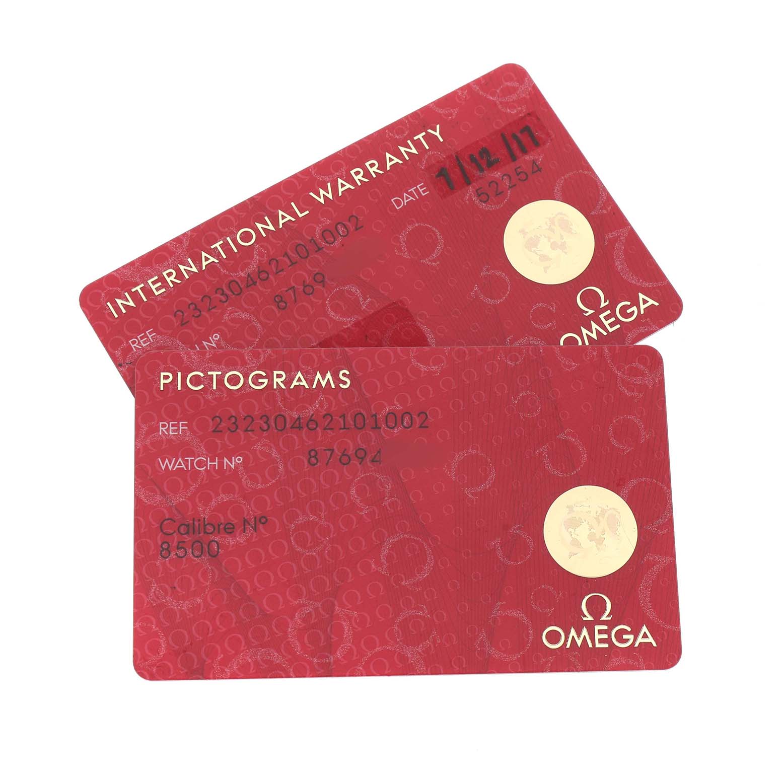 The image shows Omega Planet Ocean 232.30.46.21.01.002 Men's Stainless Steel Black Dial model warranty and pictogram cards laid overlapping.