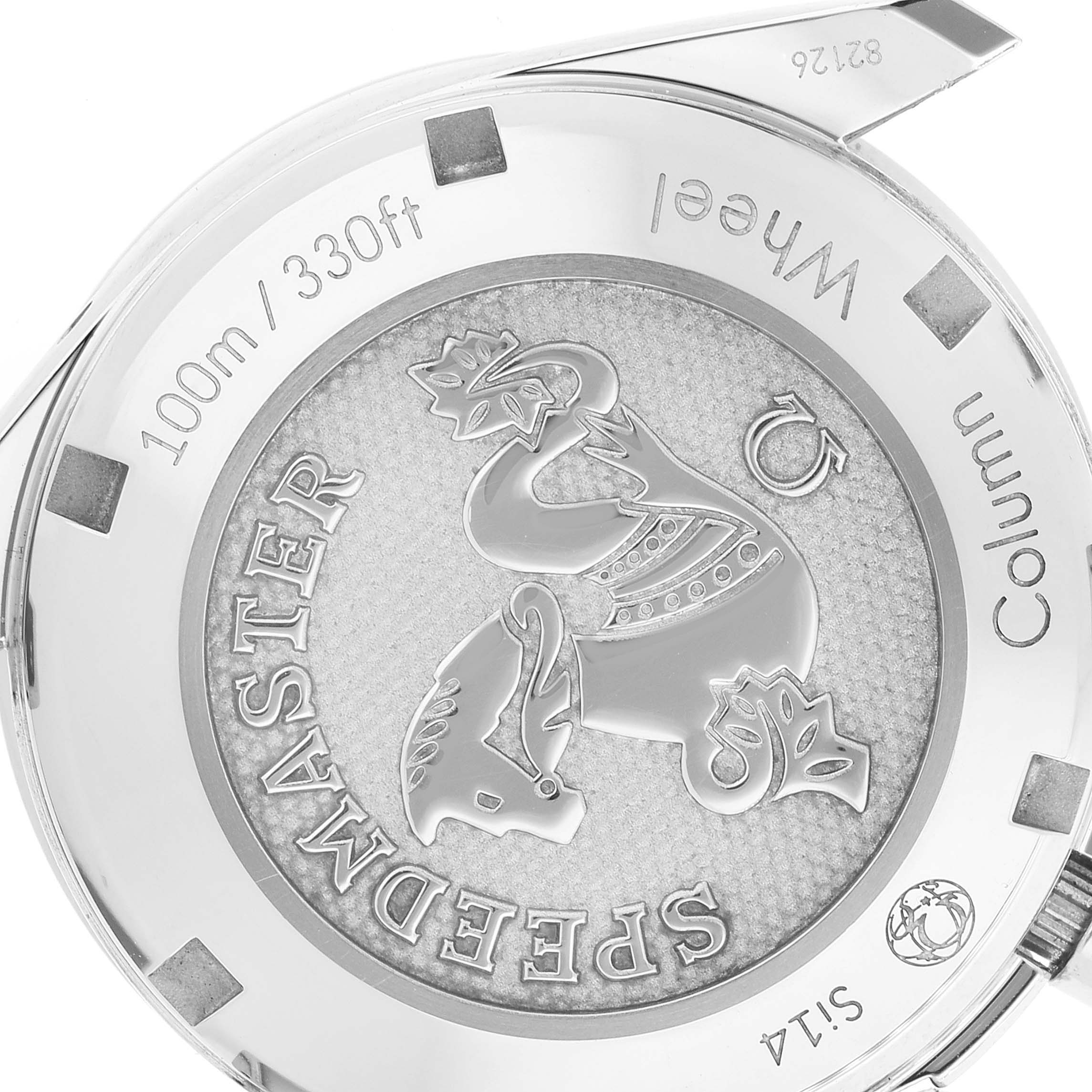 The image shows the back case of an Omega Speedmaster 324.32.38.50.06.001 Men
s Stainless Steel Grey Dial 324.32.38.50.06.001 Men
s Stainless Steel Grey Dial watch, highlighting its branding and engraving details.