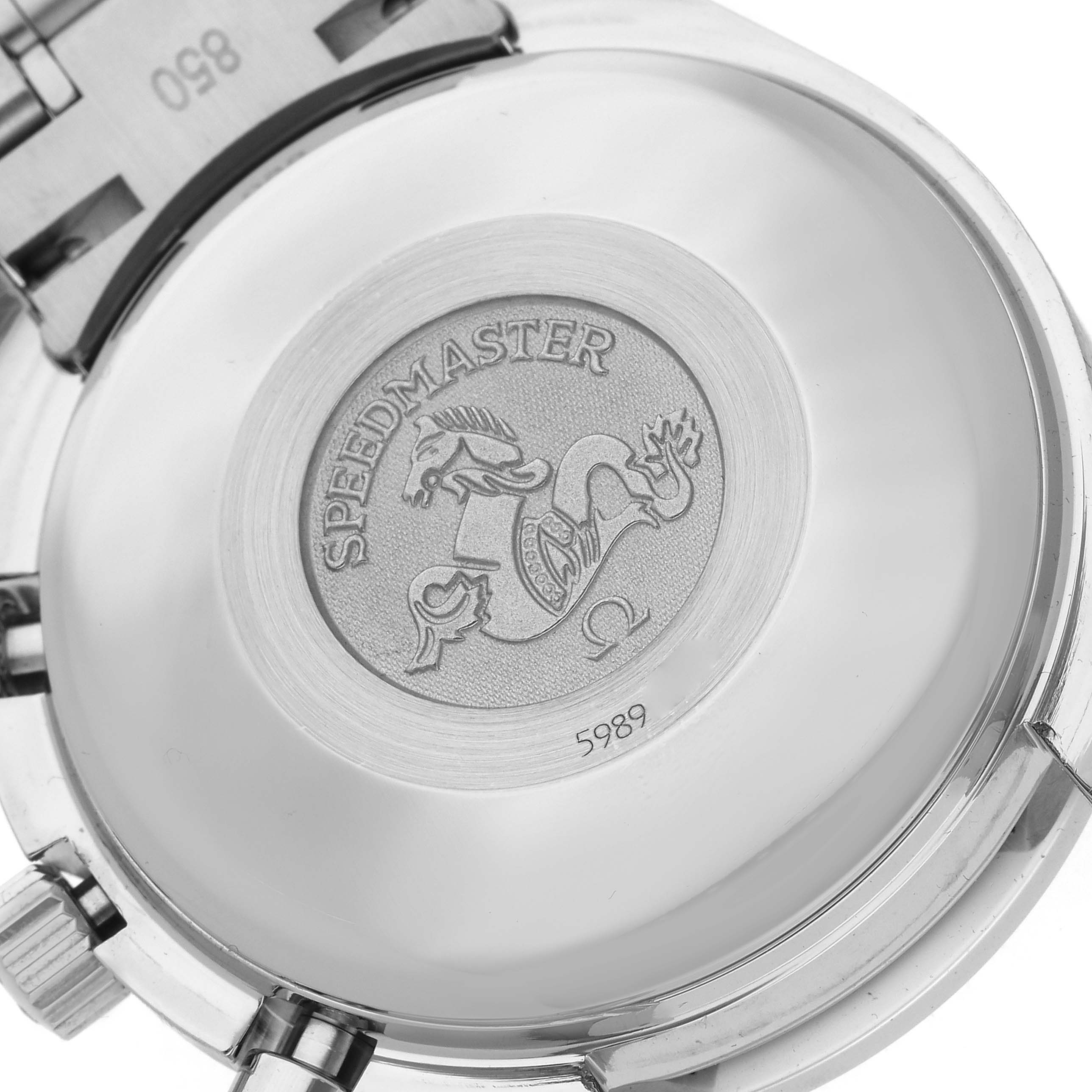 The image shows the back case of an Omega Speedmaster 3513.50.00 Men
s Stainless Steel Black Dial 3513.50.00 Men
s Stainless Steel Black Dial, featuring an engraved emblem and serial number.