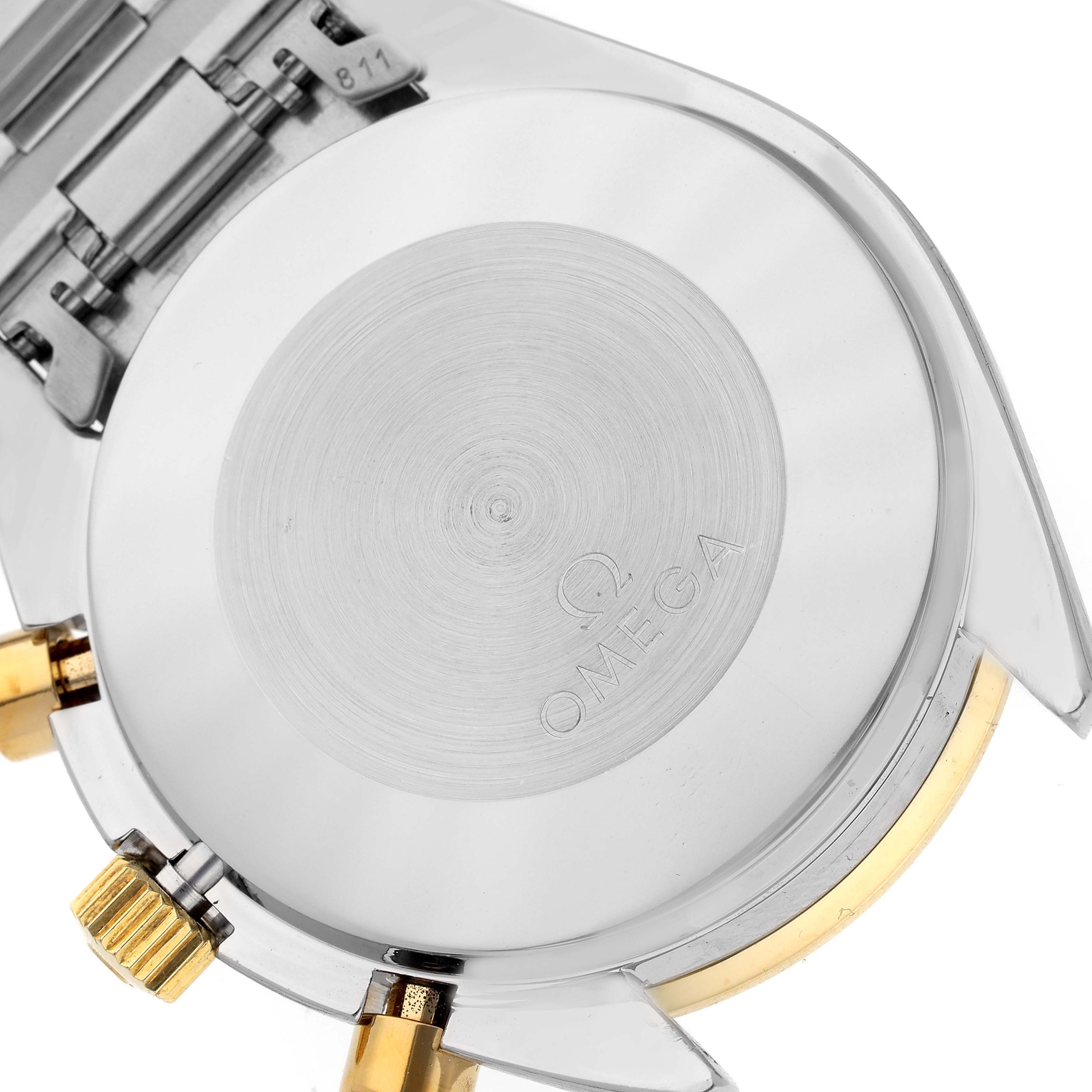 The image shows the back case and lugs of an Omega Speedmaster 3310.20.00 Men's Steel and Gold (two tone) White Dial 3310.20.00 Men's Steel and Gold (two tone) White Dial watch, along with parts of the bracelet and crown.