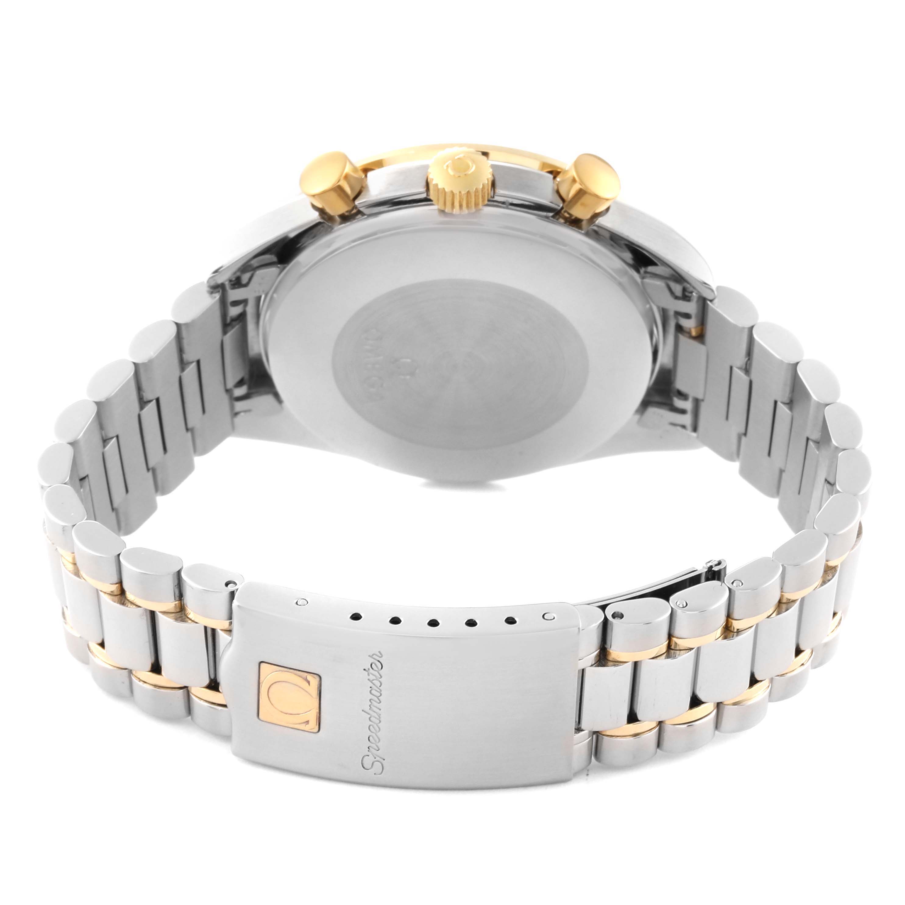 This image shows the back and clasp of an Omega Speedmaster 3310.20.00 Men's Steel and Gold (two tone) White Dial 3310.20.00 Men's Steel and Gold (two tone) White Dial watch, with a focus on its two-tone bracelet and case back.