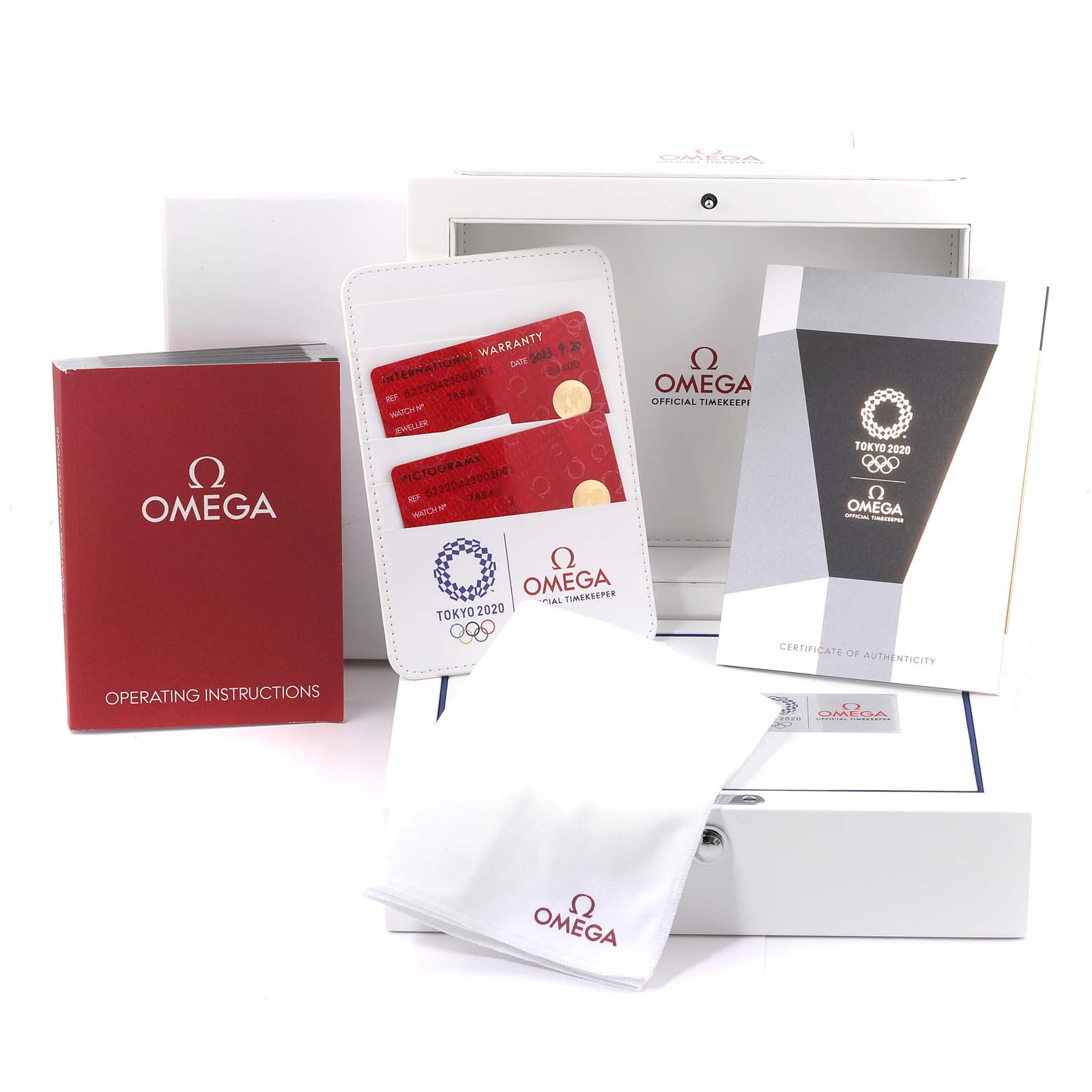 This image shows Omega Speedmaster 522.20.42.30.01.001 Men's Steel and Gold (two tone) Black Dial 522.20.42.30.01.001 Men's Steel and Gold (two tone) Black Dial accessories, including the box, instruction booklet, warranty cards, certificate, and cloth.