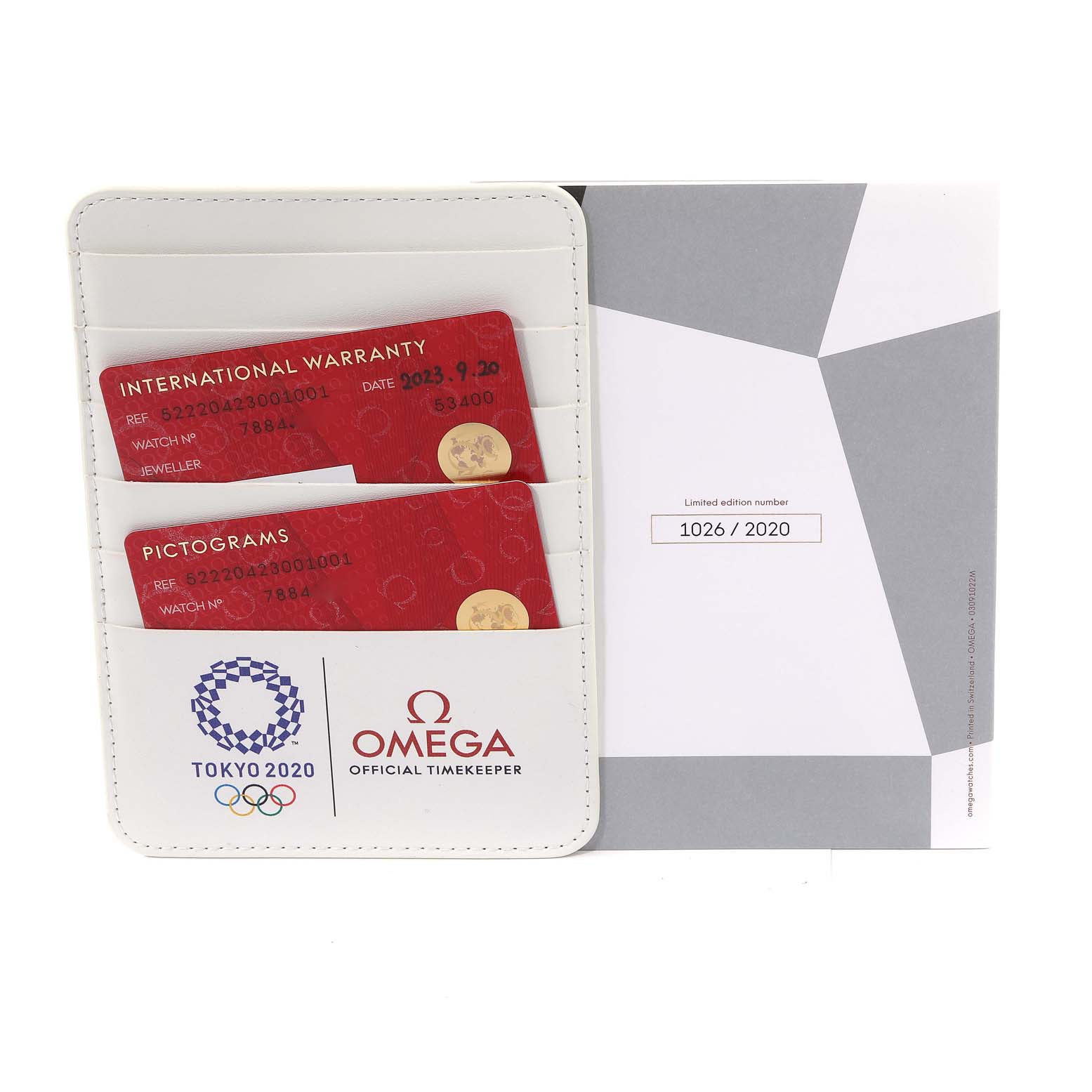 The image shows Omega Speedmaster 522.20.42.30.01.001 Men's Steel and Gold (two tone) Black Dial 522.20.42.30.01.001 Men's Steel and Gold (two tone) Black Dial warranty cards and paperwork, including a limited edition card numbered 1026/2020.