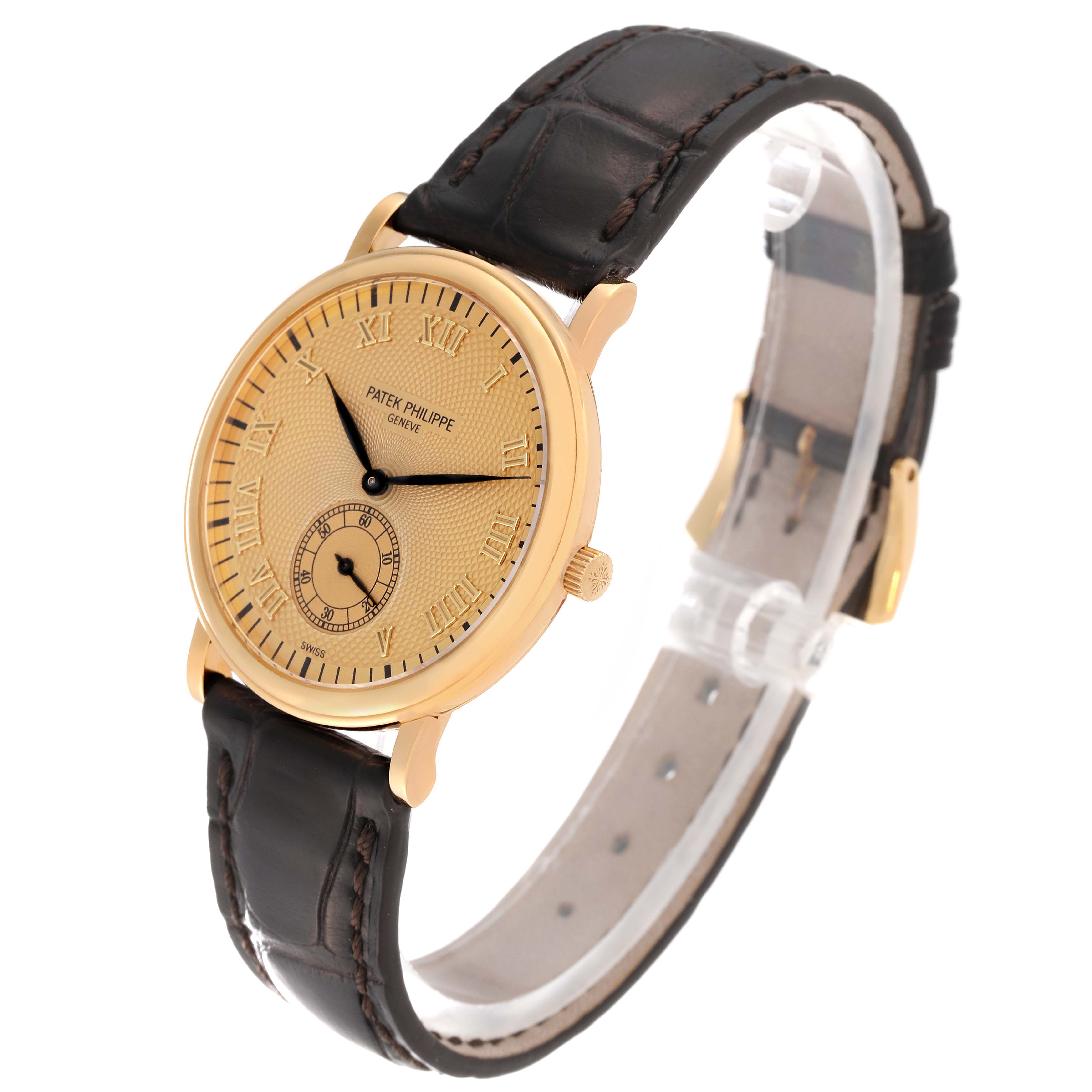 The image shows a side-angle view of the Patek Philippe Calatrava 5022 Men's Yellow Gold Champagne Dial 5022 Men's Yellow Gold Champagne Dial watch, displaying its face, brown leather strap, and golden case.