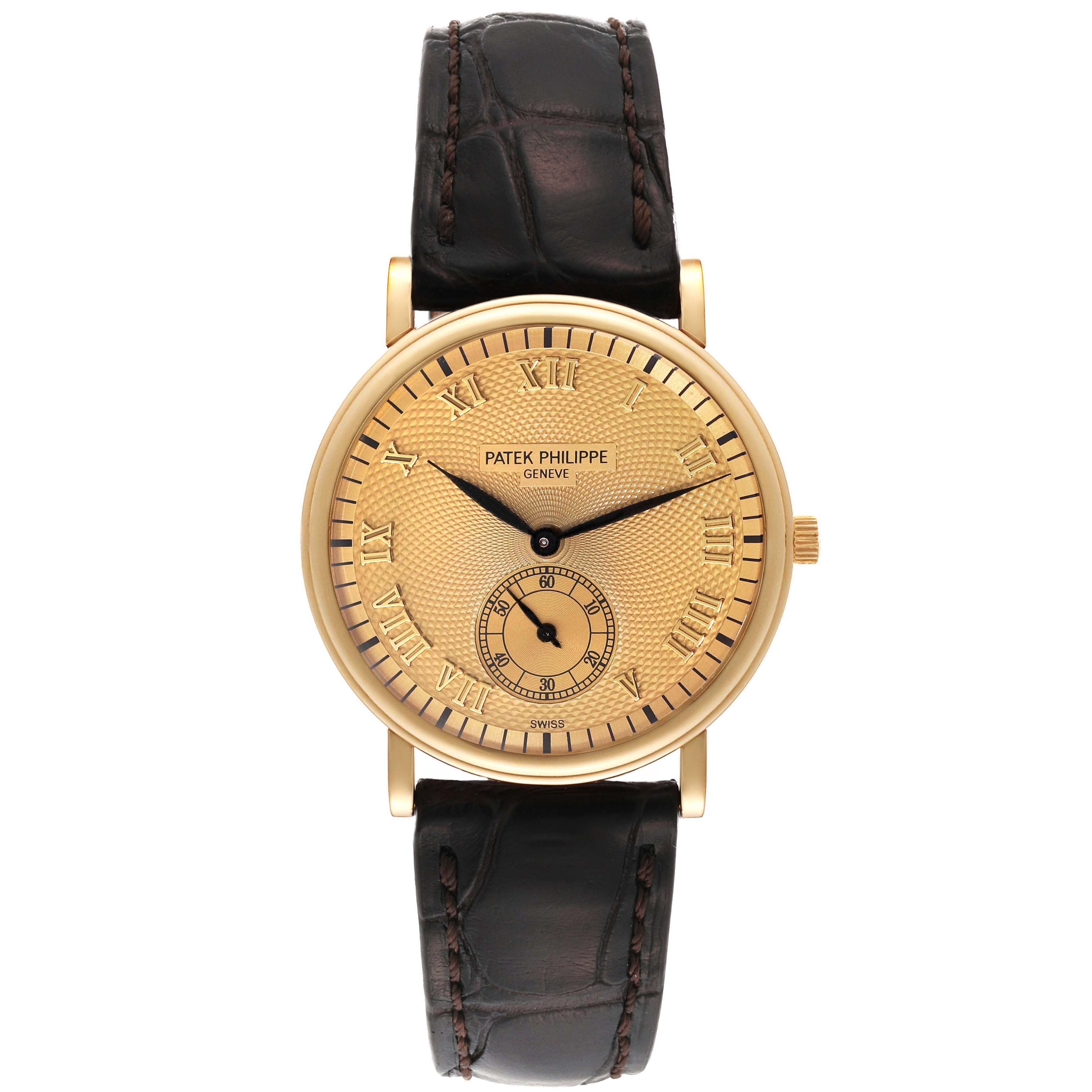This image shows a front view of a Patek Philippe Calatrava 5022 Men's Yellow Gold Champagne Dial 5022 Men's Yellow Gold Champagne Dial watch, highlighting its gold case, dial, and leather strap.
