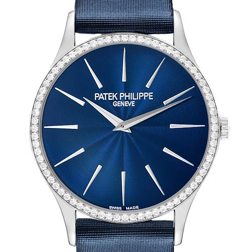 The Patek Philippe Calatrava 4897G-001 Women's White Gold Blue Dial watch is shown from the front, highlighting its blue dial, diamond bezel, and silver hands.