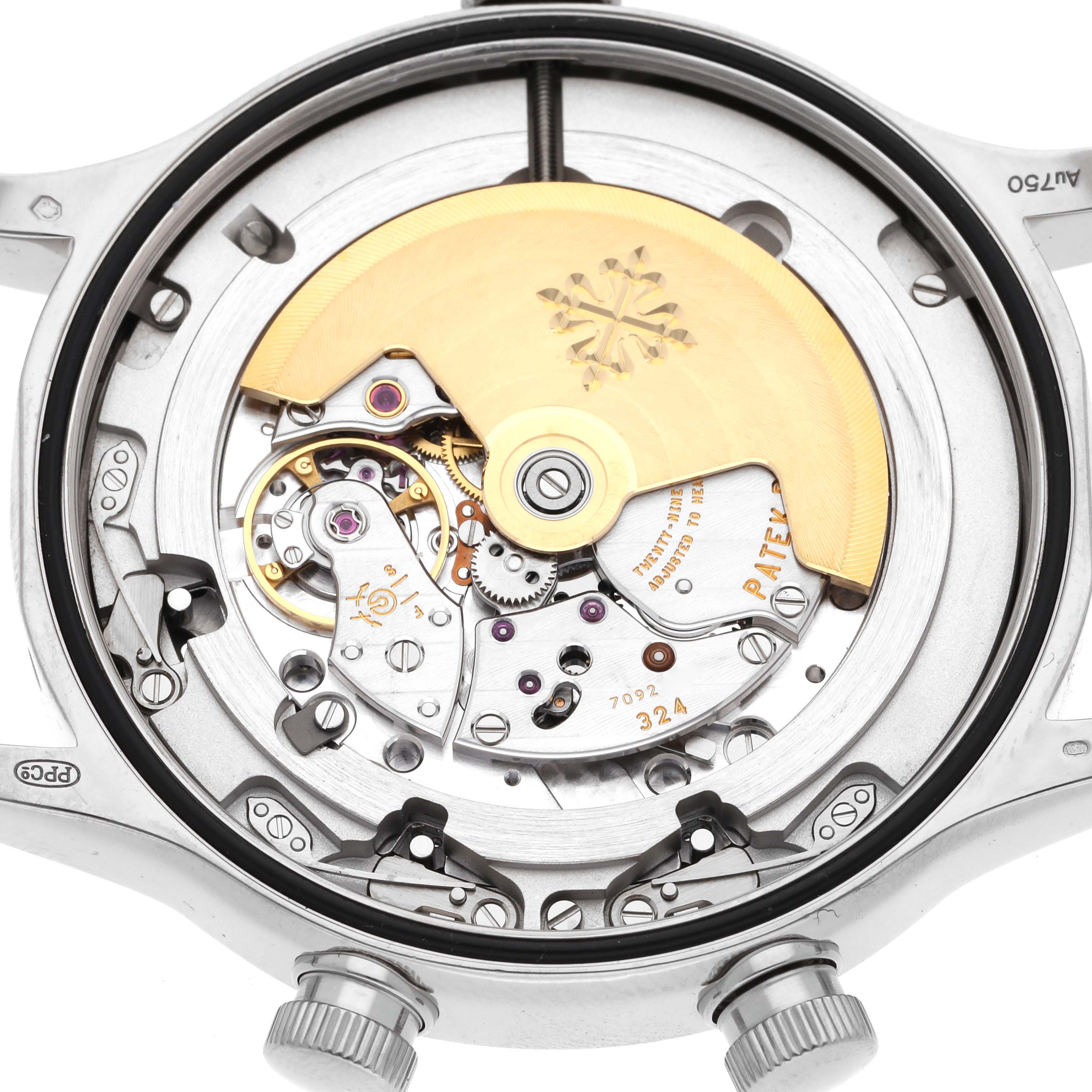 This image shows the internal mechanism of a Patek Philippe Calatrava 5524G-001 Men's White Gold Black Dial 5524G-001 Men's White Gold Black Dial watch from a top-down angle, focusing on its movement and rotor.