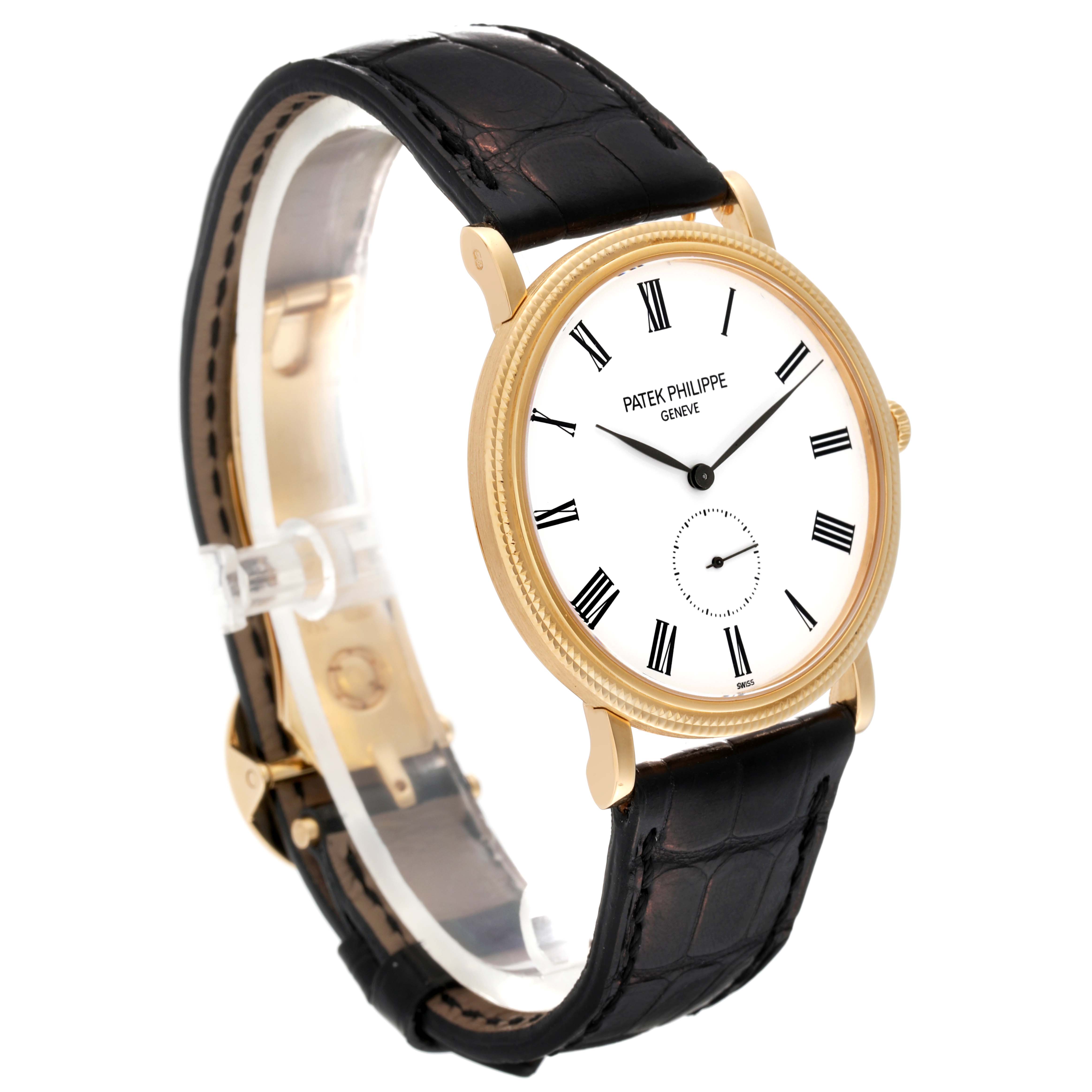 This image shows a side angle view of the Patek Philippe Calatrava 5119J Men's Yellow Gold White Dial 5119J Men's Yellow Gold White Dial watch, displaying its dial, case, and leather strap.