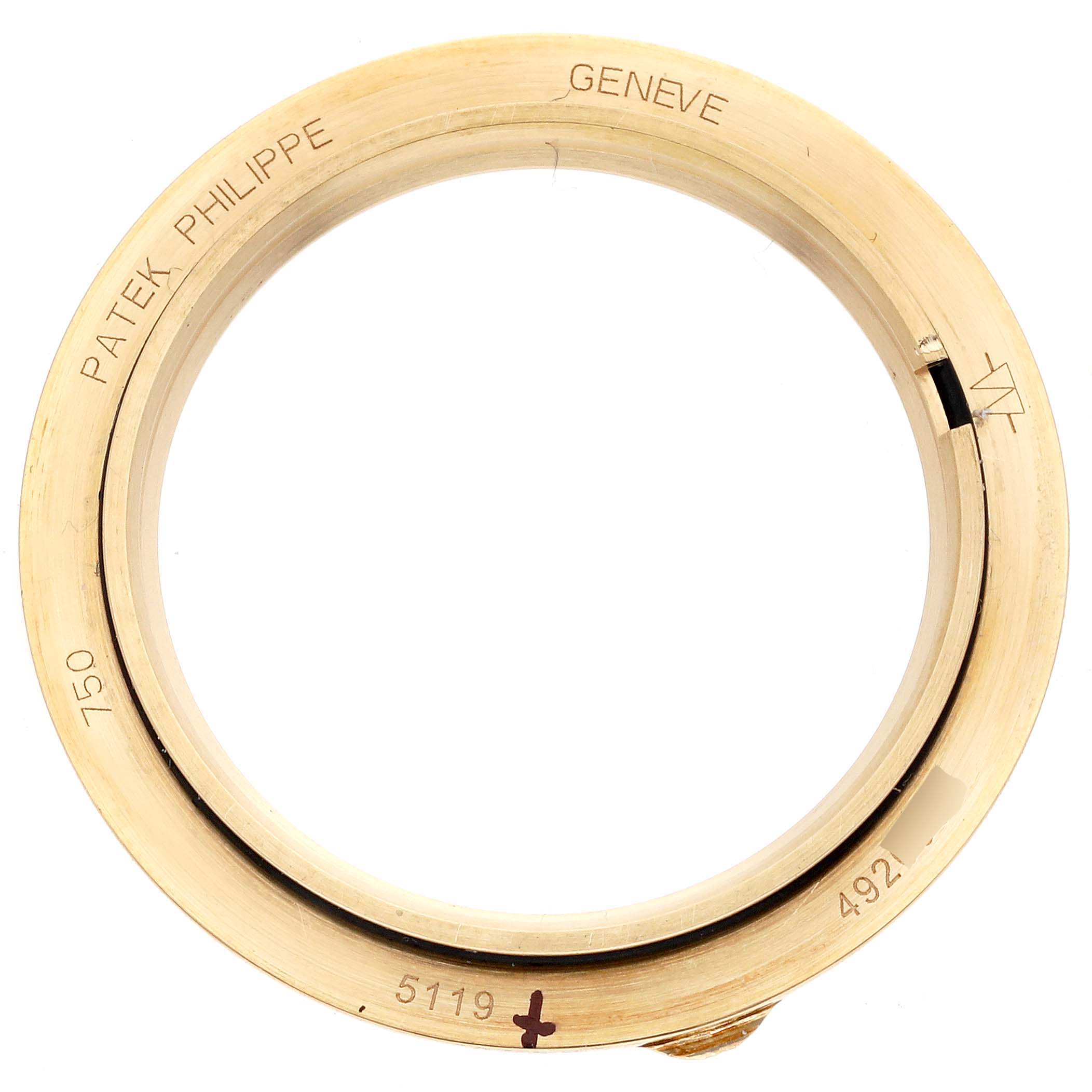 This image shows a close-up of the bezel of a Patek Philippe Calatrava 5119J Men's Yellow Gold White Dial 5119J Men's Yellow Gold White Dial model watch.