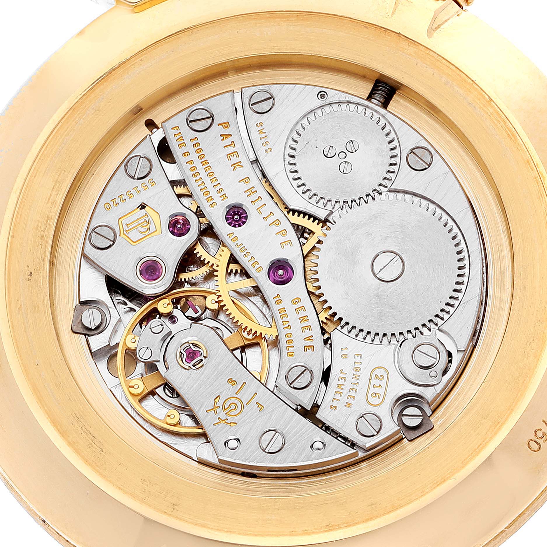 The image shows the intricate movement and internal mechanism of a Patek Philippe Calatrava 5119J Men
s White Gold White Dial 5119J Men
s White Gold White Dial watch from a rear angle.