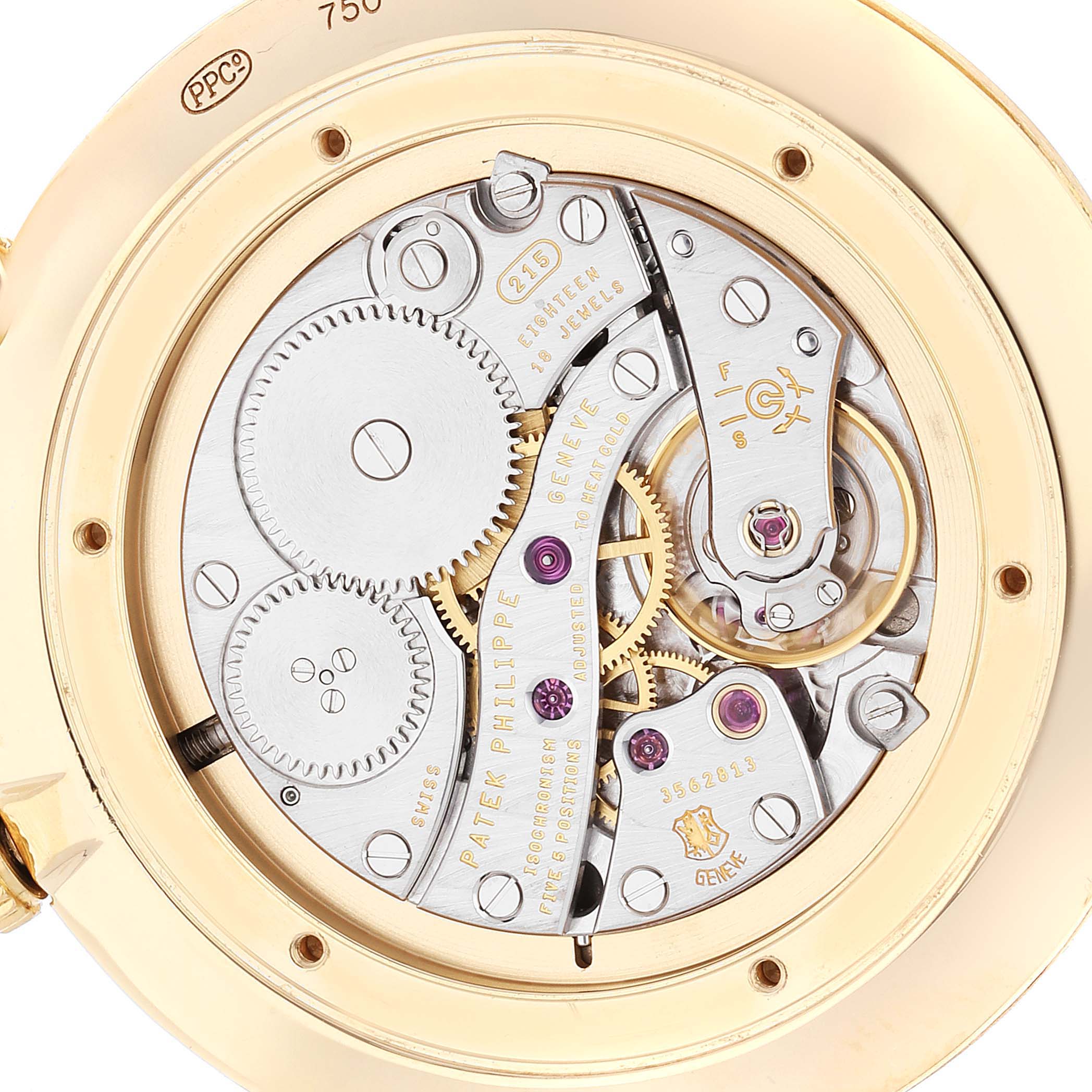 The image shows the case back of a Patek Philippe Calatrava 5119J Men's Yellow Gold White Dial 5119J Men's Yellow Gold White Dial watch, revealing the intricate mechanical movement.