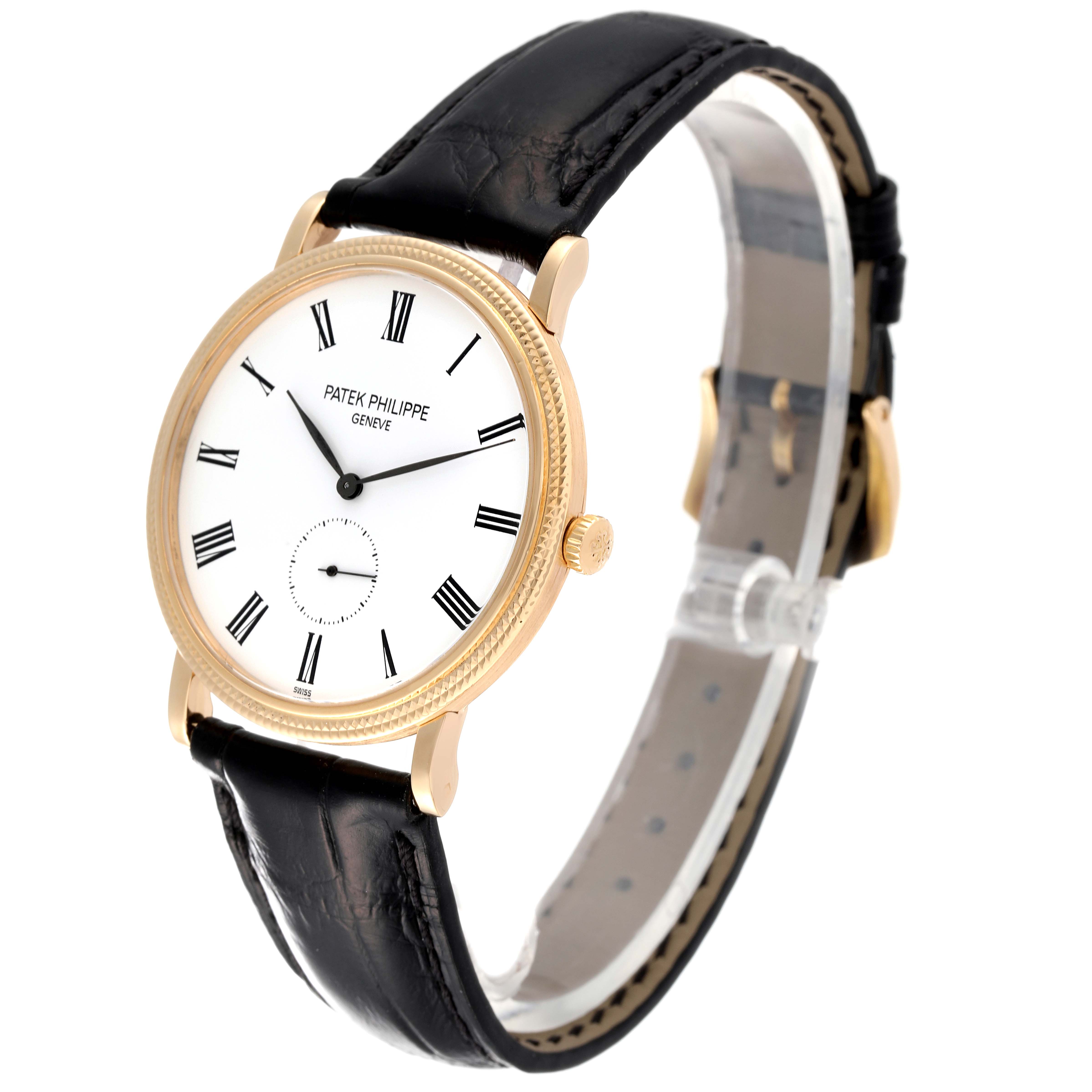 The image shows a Patek Philippe Calatrava 5119J Men's Yellow Gold White Dial 5119J Men's Yellow Gold White Dial watch from a slight side angle, highlighting the dial, case, and leather strap.