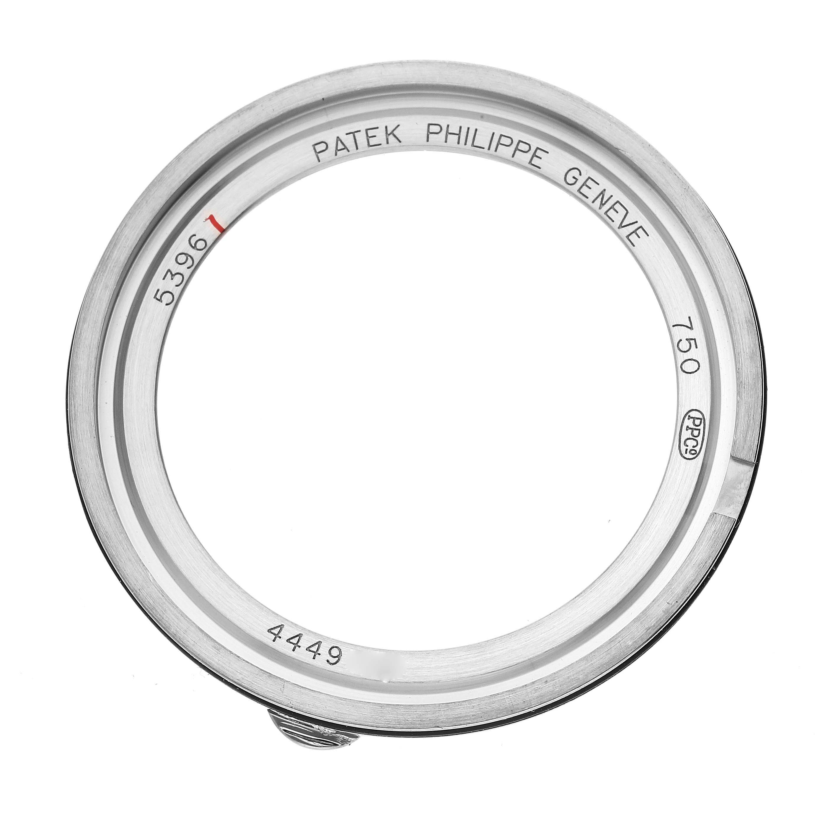 This image shows a Patek Philippe Complications 5396G Men's White Gold Silver Dial 5396G Men's White Gold Silver Dial model bezel, viewed from the front displaying engraving details.