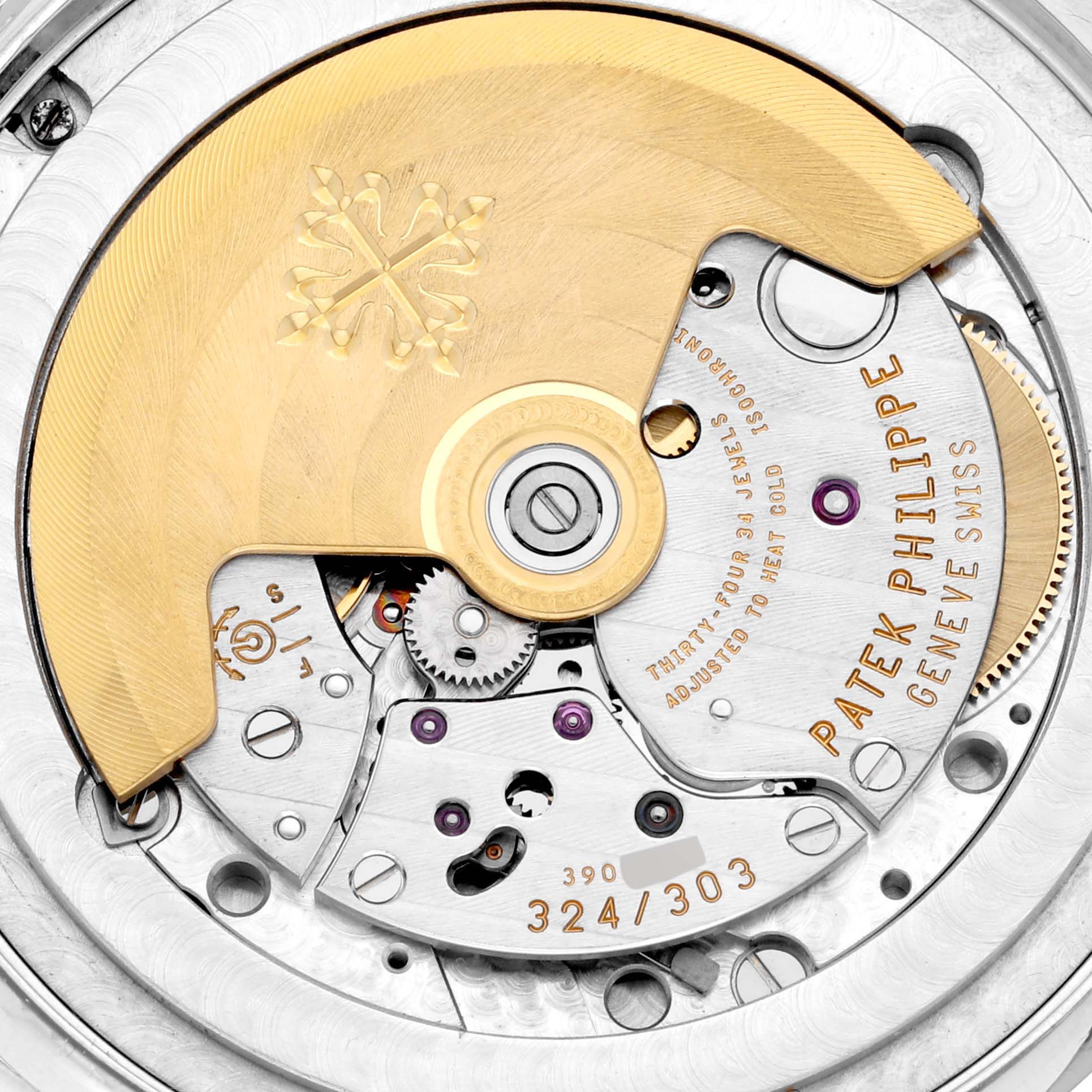 The image shows the intricate movement mechanism of a Patek Philippe Complications 5396G Men
s White Gold Silver Dial 5396G Men
s White Gold Silver Dial model watch from a close-up, top-down angle.