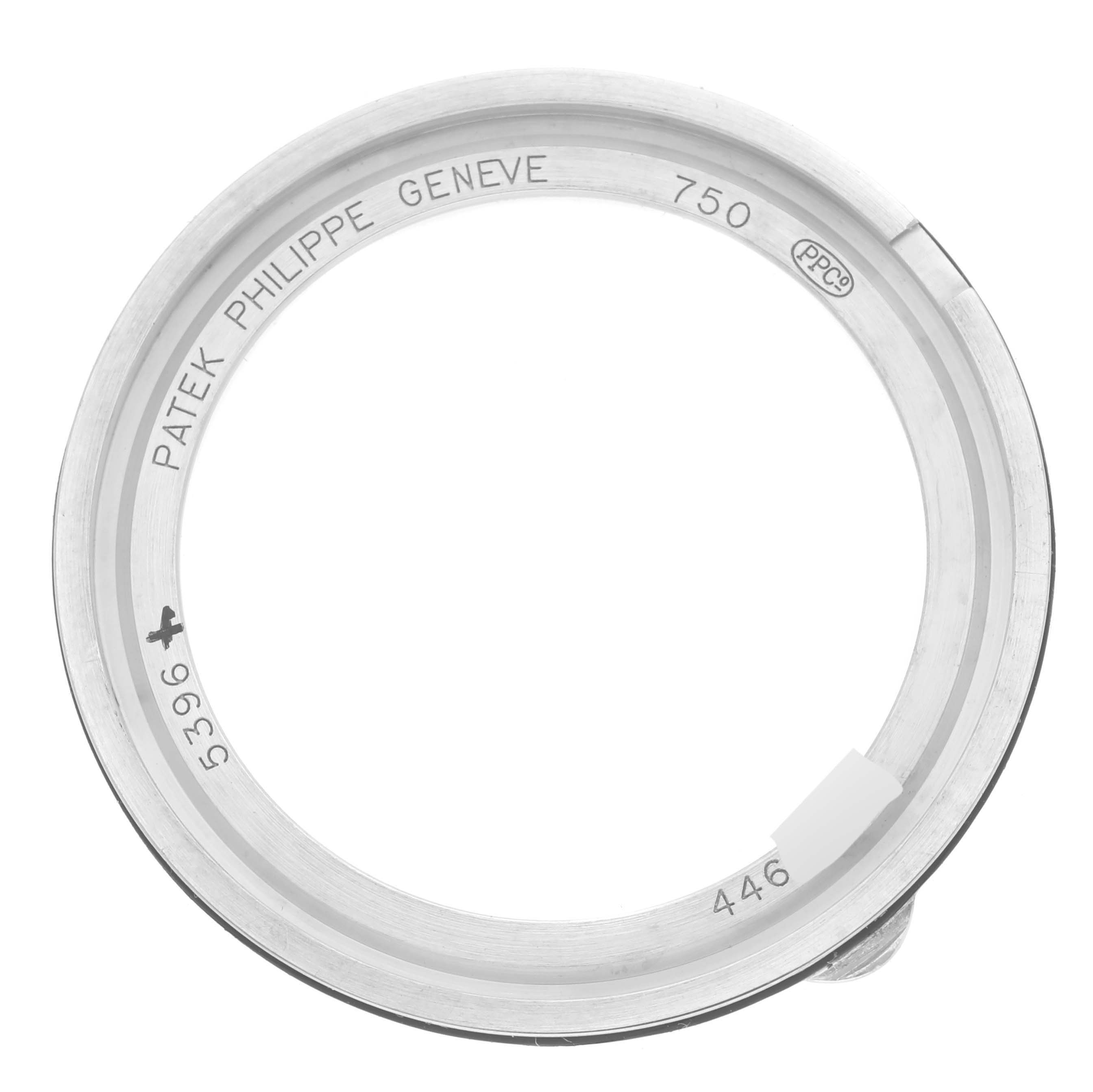 This image shows the bezel from a Patek Philippe Complications 5396G Men
s White Gold Silver Dial 5396G Men
s White Gold Silver Dial model, viewed from top-down.