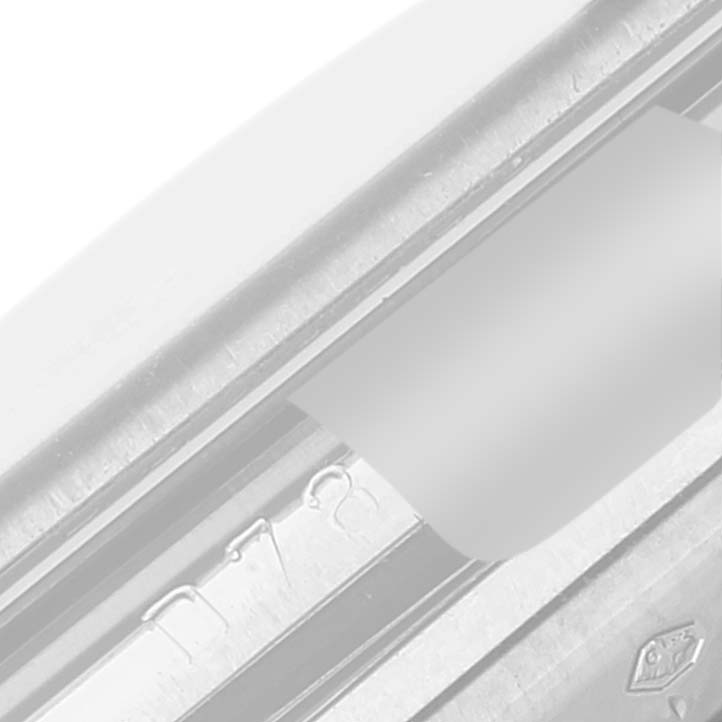 This image shows a close-up angle of the serial number area on the Rolex Cellini 5443/9 Men's White Gold Black Dial 5443/9 Men's White Gold Black Dial model watch.