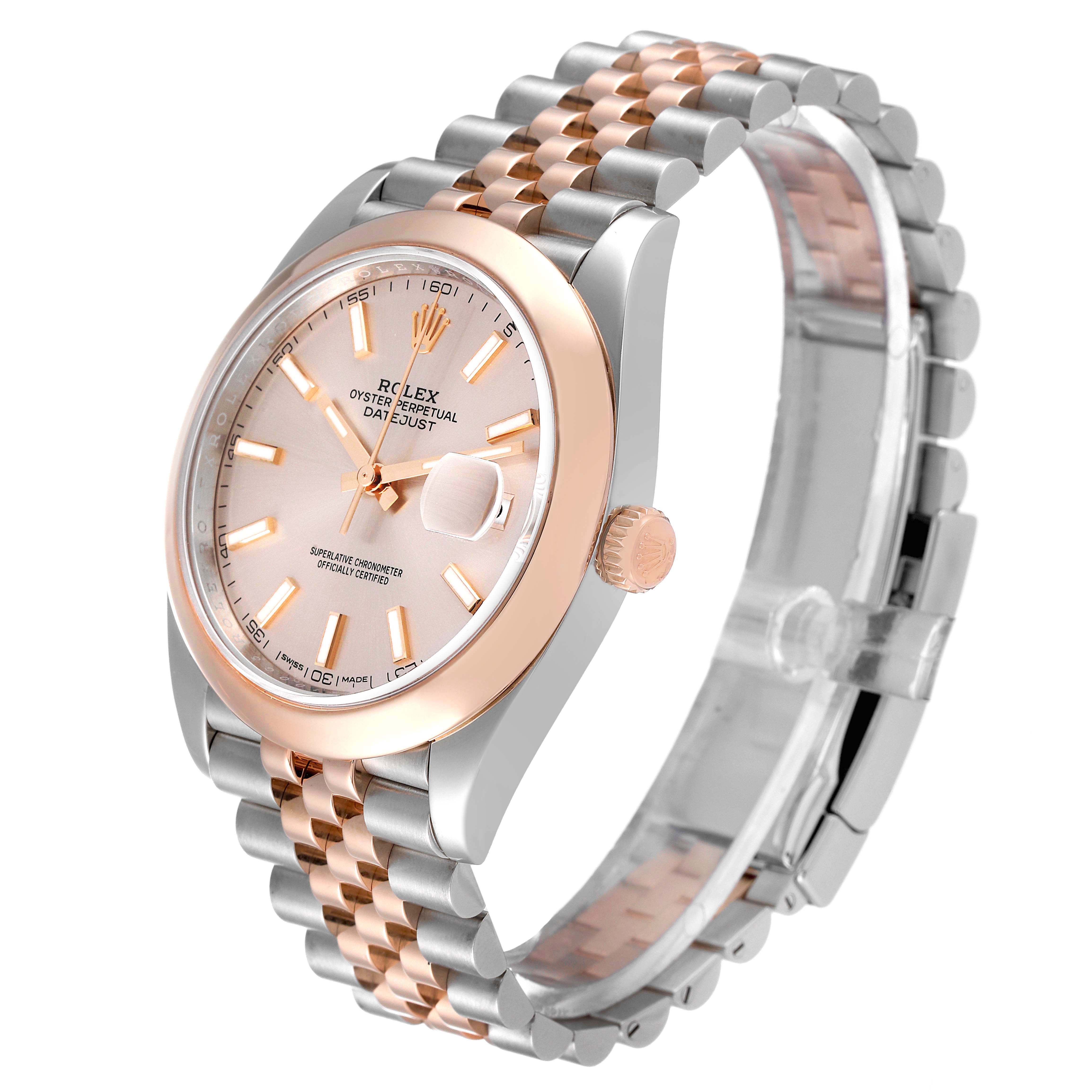 The Rolex Datejust 41 126301 Men
s Steel and Gold (two tone) Pink Dial is shown at a three-quarter angle, highlighting the dial, bezel, crown, and two-tone Jubilee bracelet.