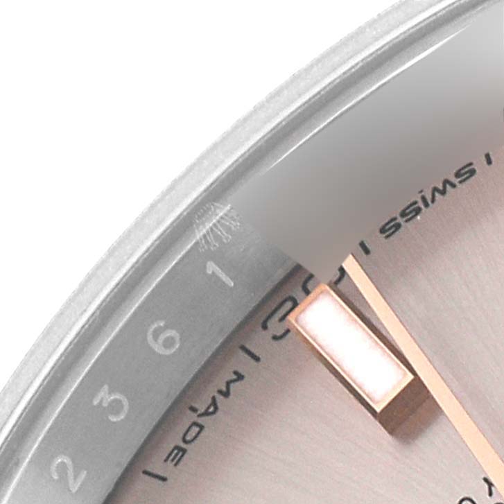 The image shows a close-up of the dial edge, hour marker, and part of the bezel of a Rolex Datejust 41 126301 Men
s Steel and Gold (two tone) Pink Dial watch.
