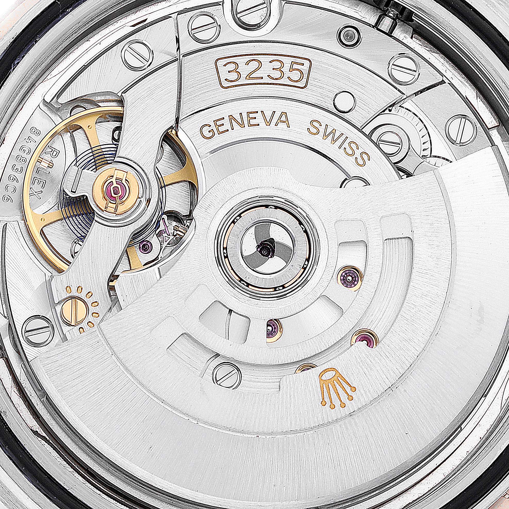 This image shows the internal mechanical movement of the Rolex Datejust 41 126301 Men
s Steel and Gold (two tone) Pink Dial 126301 Men
s Steel and Gold (two tone) Pink Dial, specifically the 3235 caliber.
