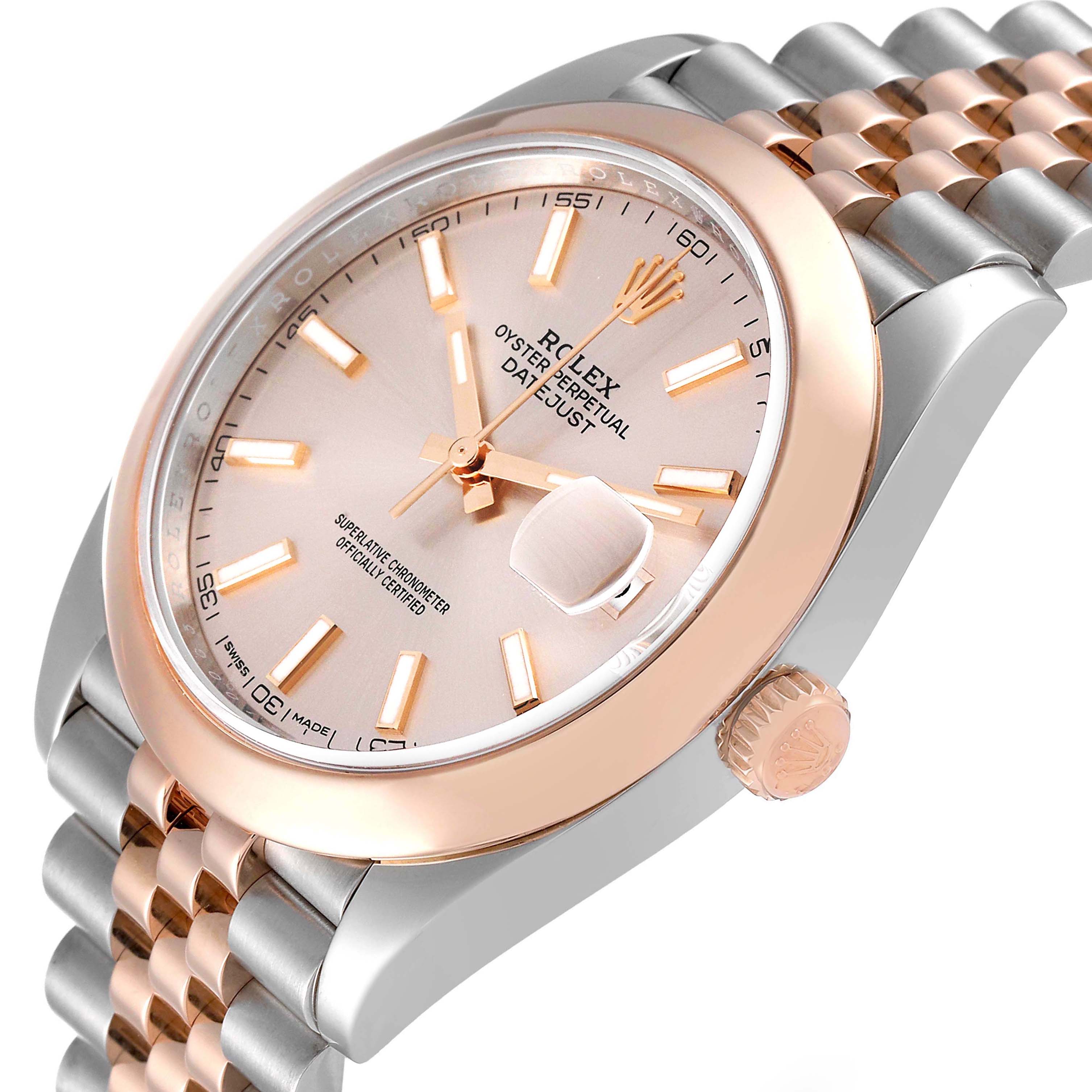 The image shows a Rolex Datejust 41 126301 Men
s Steel and Gold (two tone) Pink Dial watch from a side angle, highlighting its two-tone bracelet, dial, and crown.