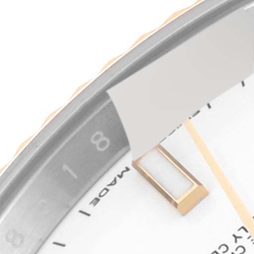 The image shows a close-up of the bezel, part of the dial, and a date window of a Rolex Datejust 41 126333 Men's Steel and Gold (two tone) White Dial 126333 Men's Steel and Gold (two tone) White Dial watch.