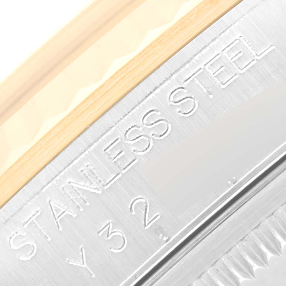 The close-up image shows part of the case back of a Rolex Datejust 16233 Men's Steel and Gold (two tone) Silver Dial 16233 Men's Steel and Gold (two tone) Silver Dial watch, highlighting the "Stainless Steel" engraving.