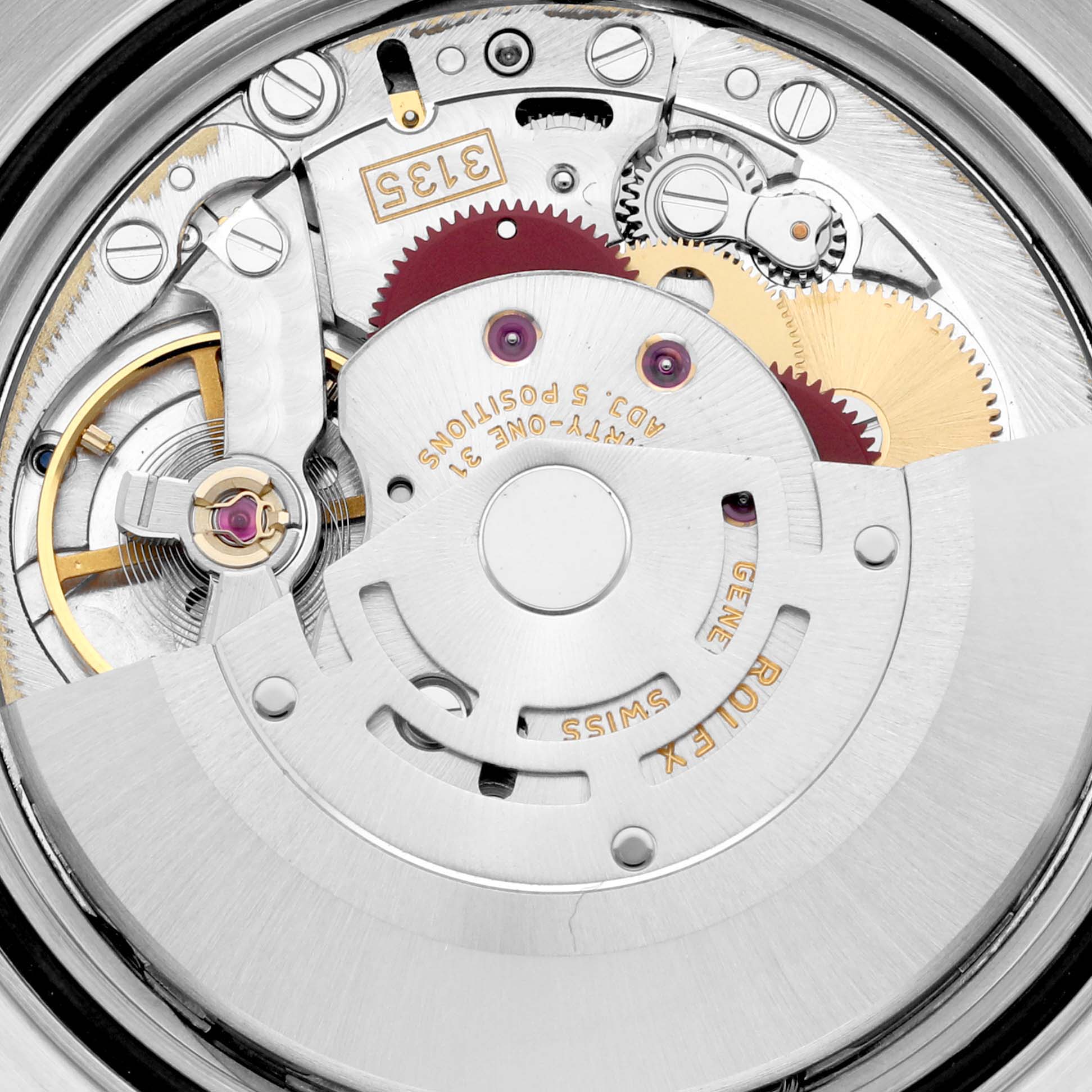 The image shows the intricate internal mechanical movement of the Rolex Datejust 16233 Men's Steel and Gold (two tone) Silver Dial 16233 Men's Steel and Gold (two tone) Silver Dial model watch, viewed from the back.