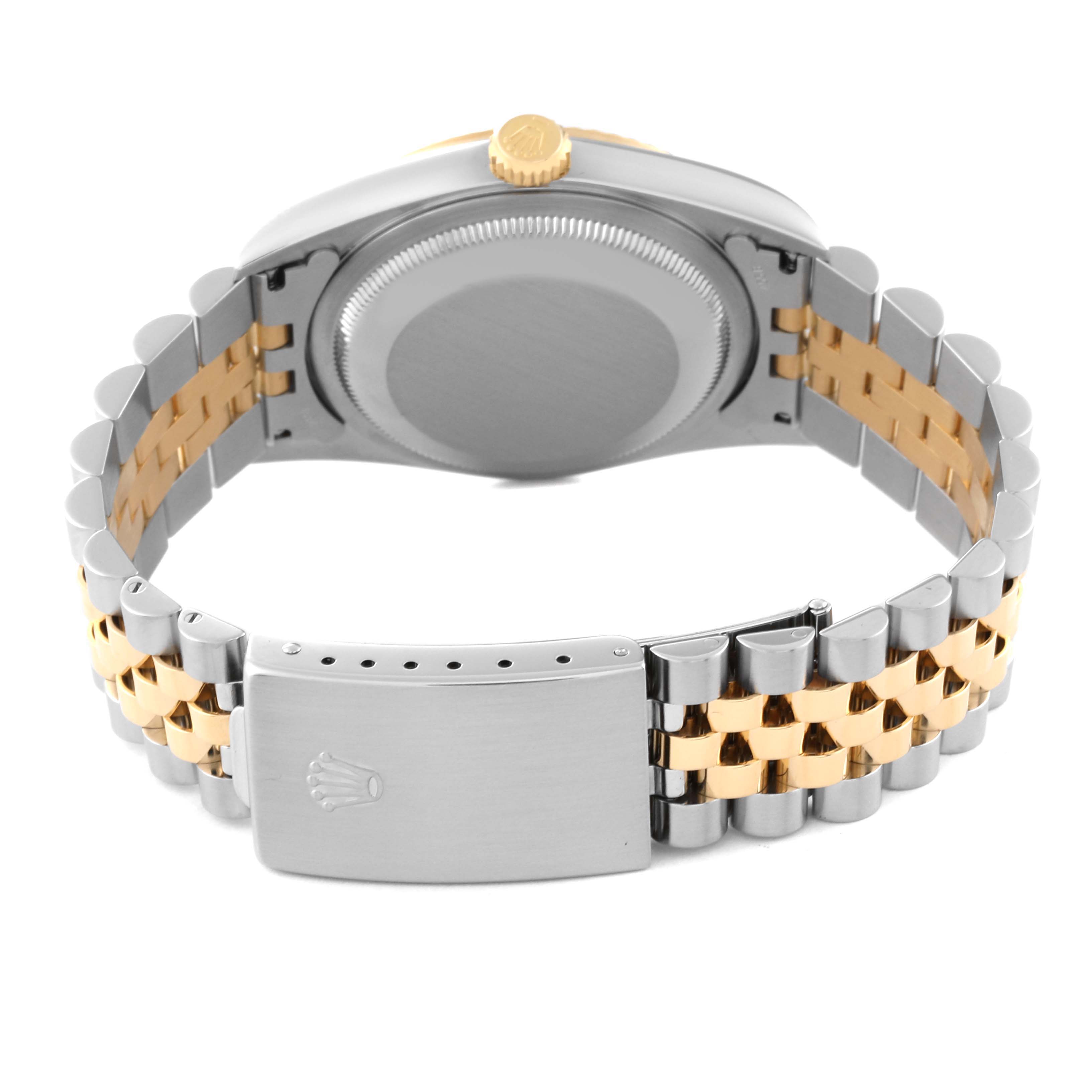 The image shows the back and clasp of a Rolex Datejust 16233 Men's Steel and Gold (two tone) Silver Dial 16233 Men's Steel and Gold (two tone) Silver Dial watch, highlighting the bi-metal bracelet and the case back.