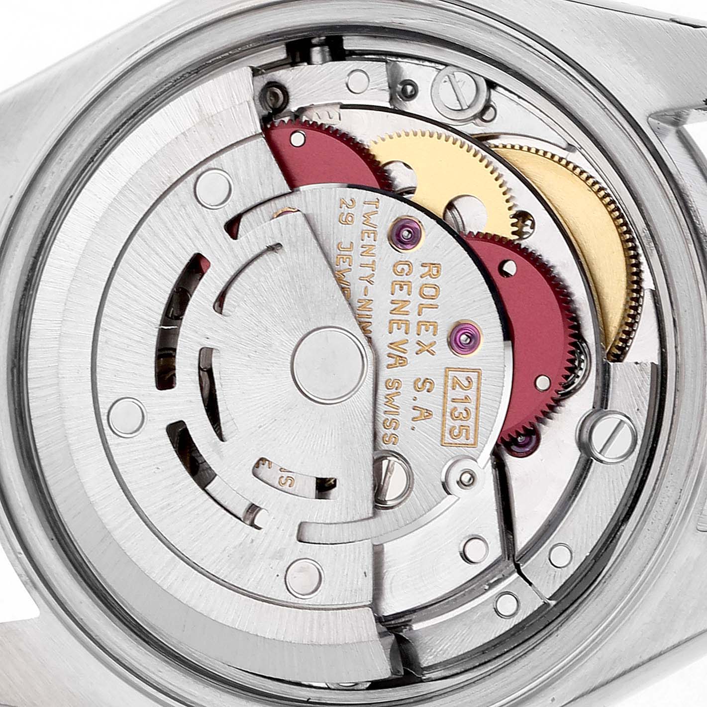 The image shows the internal movement of a Rolex Datejust 69240 Men's Stainless Steel Blue Dial, focusing on gears and engravings from a top-down angle.