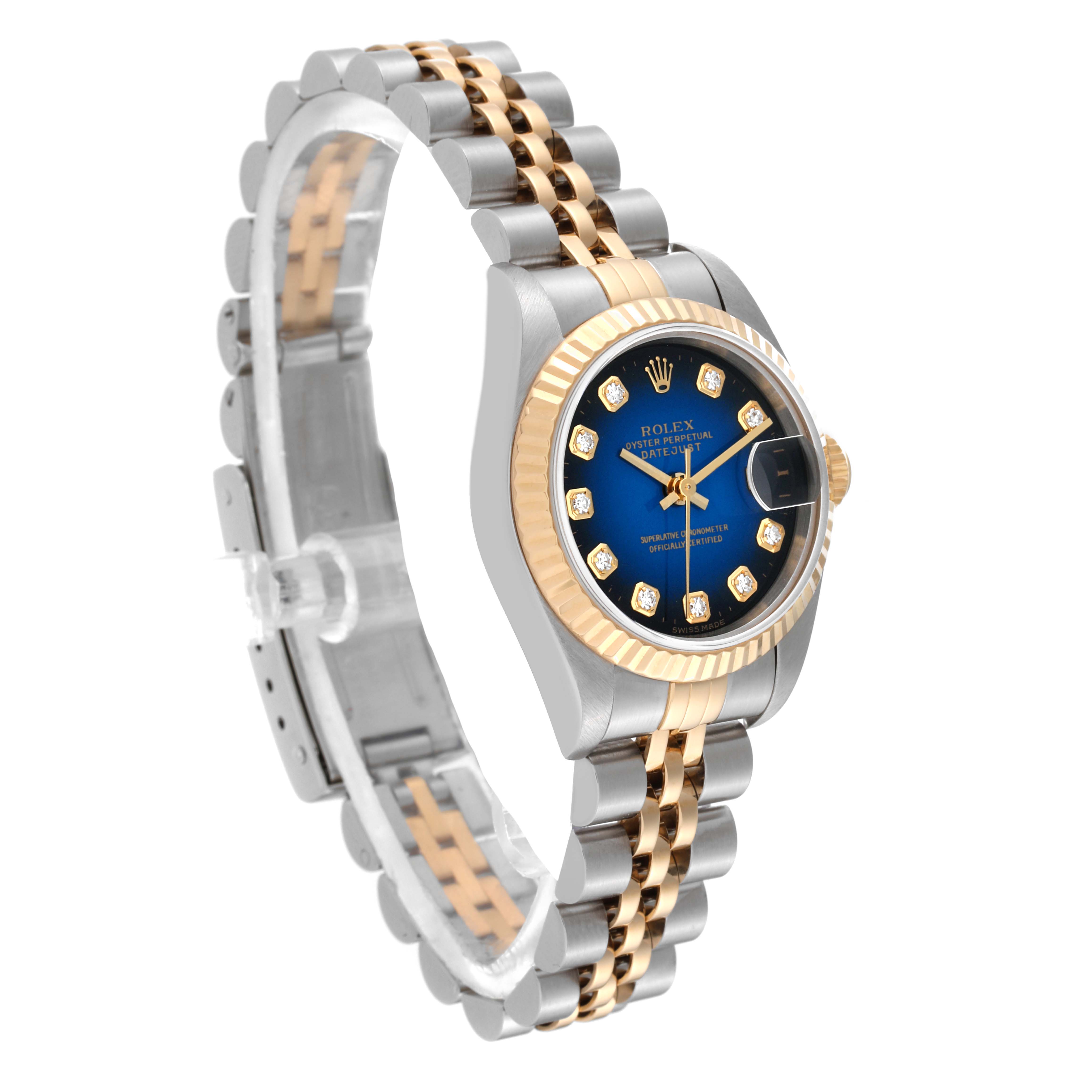 This image shows a Rolex Datejust 69173 Women's Steel and Gold (two tone) Blue Dial 69173 Women's Steel and Gold (two tone) Blue Dial watch at an angled view, displaying its two-tone bracelet, blue dial, and diamond hour markers.
