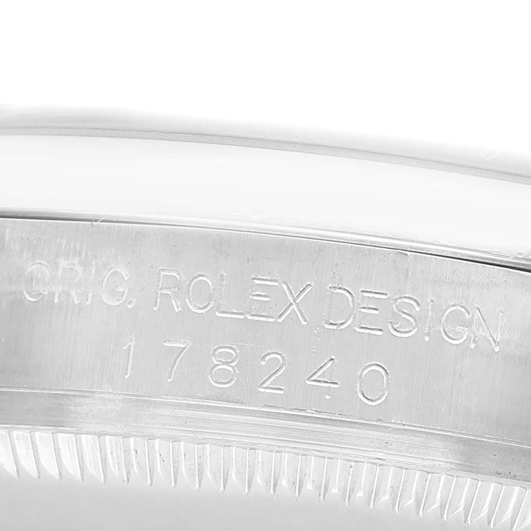 The image shows the side engraving on the bezel of a Rolex Datejust 178240 Women's Stainless Steel Grey Dial watch, highlighting the brand and model number.