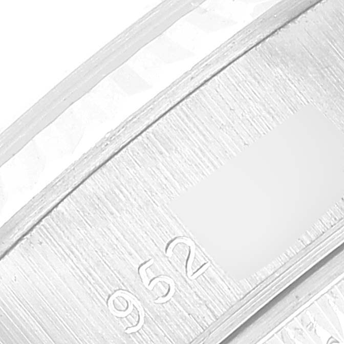 This close-up shows the inner side of the band with engraved details of the Rolex President 69179 Women's White Gold Grey Dial 69179 Women's White Gold Grey Dial model.
