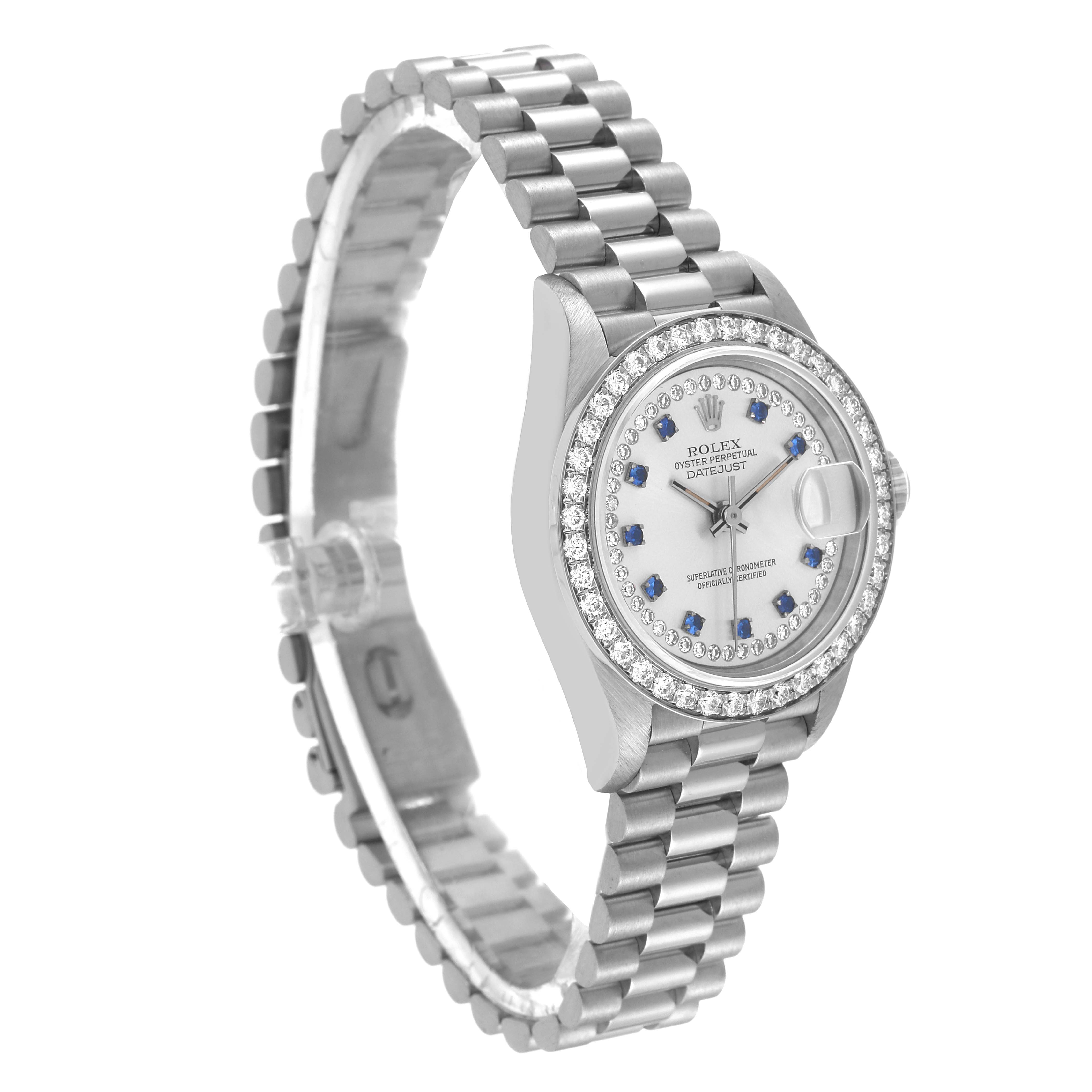 The image shows a Rolex President 69139 Women's White Gold Silver Dial 69139 Women's White Gold Silver Dial model watch at a slight angle, highlighting its bracelet, bezel, and face with date display.
