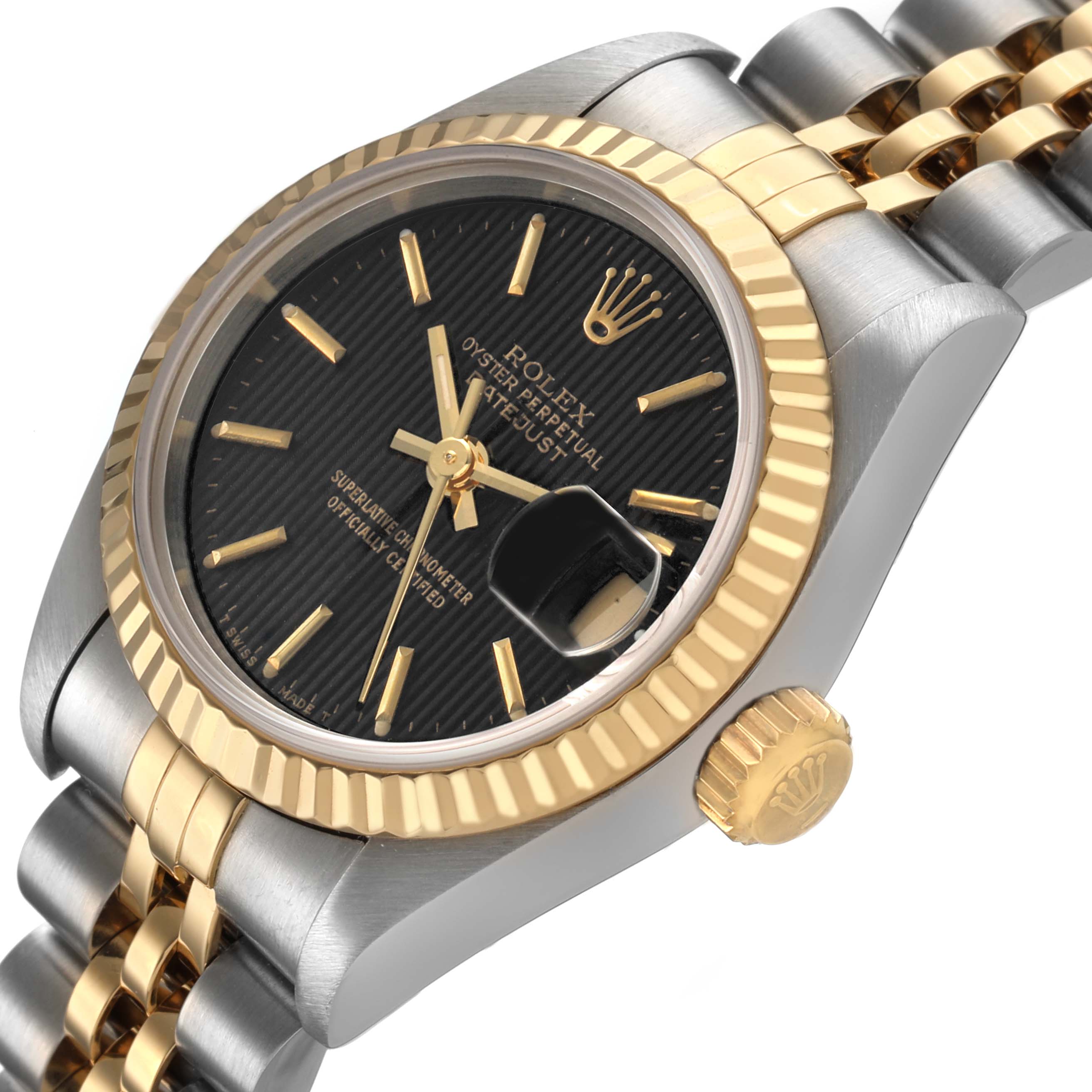 The Rolex Datejust 69173 Women's Steel and Gold (two tone) Black Dial watch is shown at a side angle, highlighting the bezel, crown, and bracelet.