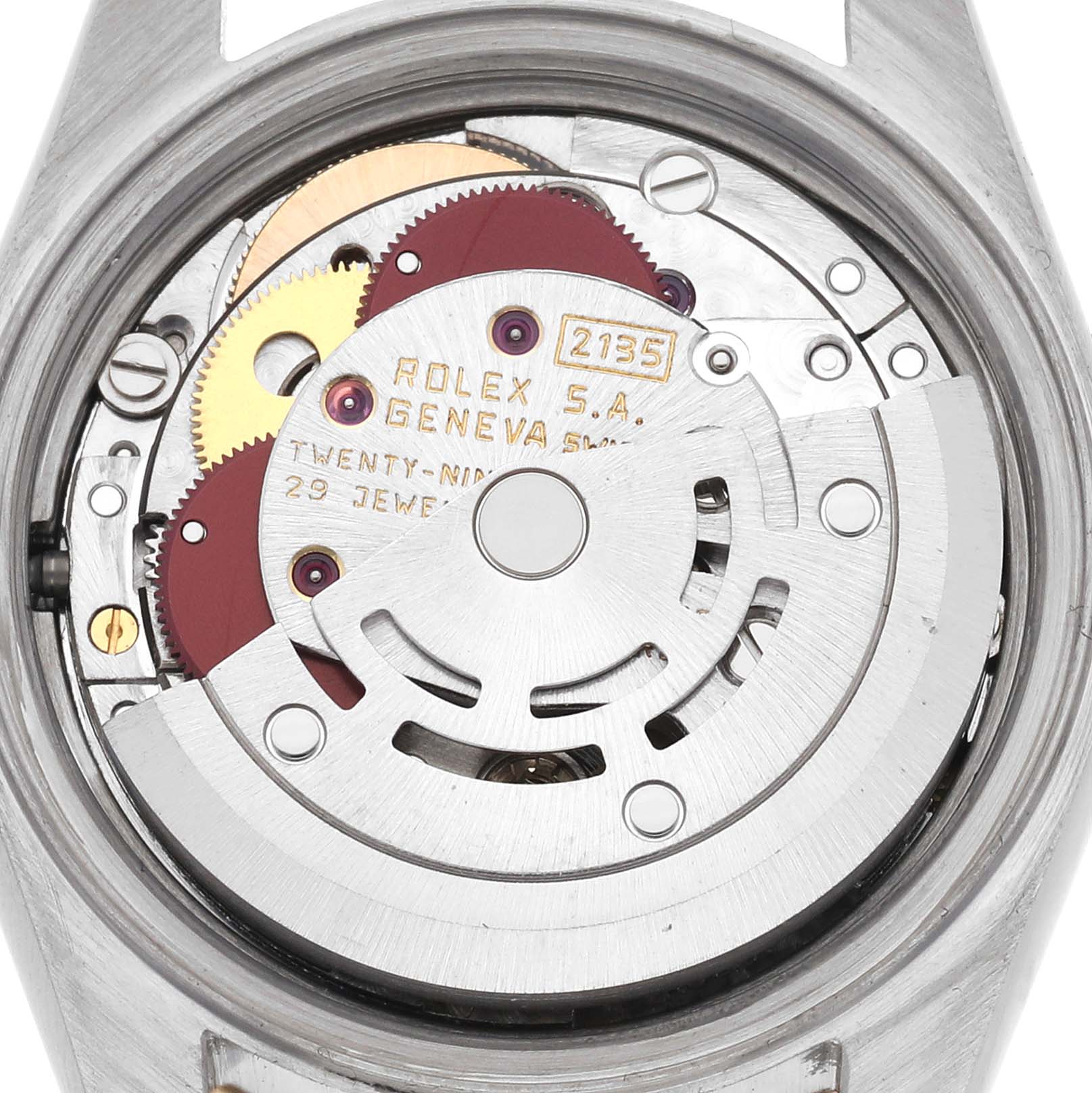 This image shows a close-up of the movement of a Rolex Datejust 69173 Women's Steel and Gold (two tone) Champagne Dial 69173 Women's Steel and Gold (two tone) Champagne Dial, highlighting its gears and rotor.