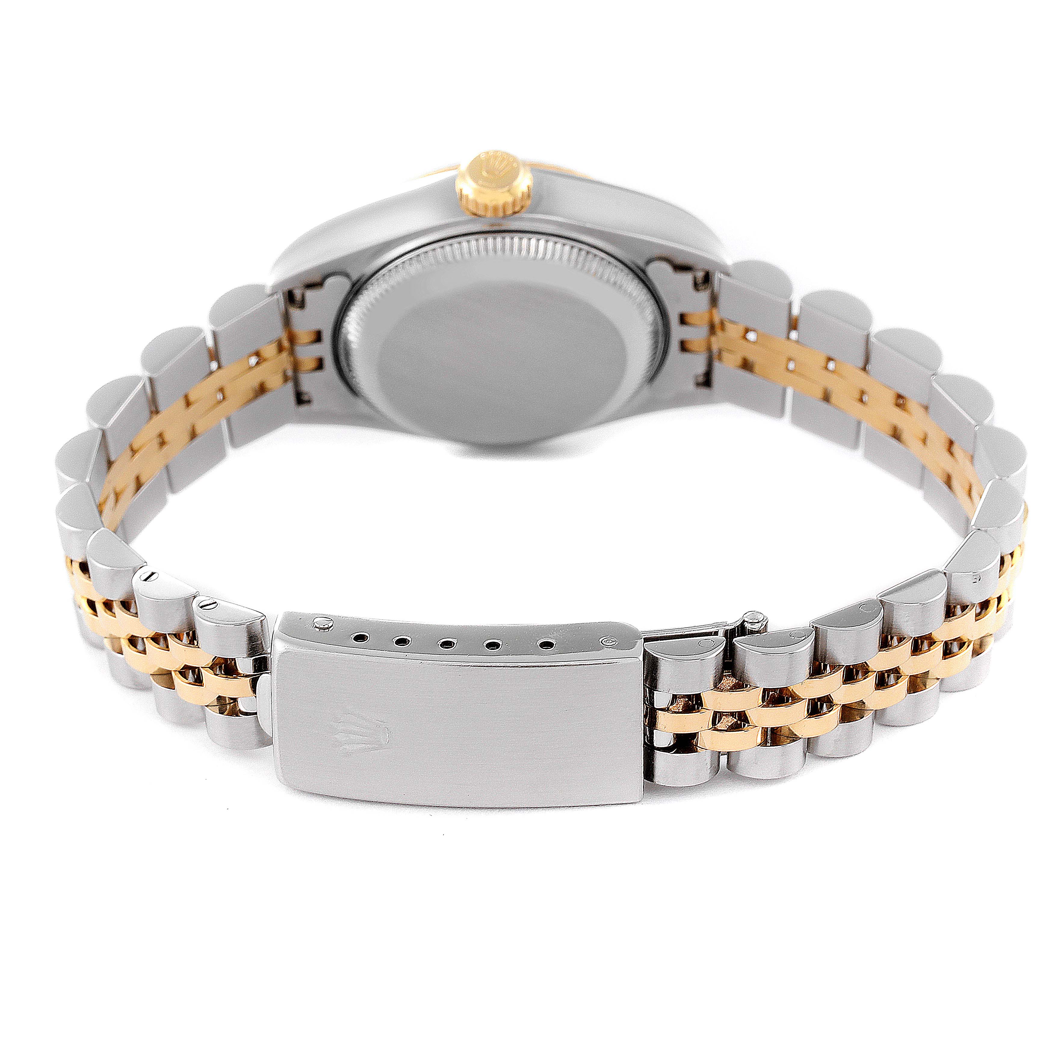 The image shows the back view of a Rolex Datejust 79173 Women's Steel and Gold (two tone) Beige Dial 79173 Women's Steel and Gold (two tone) Beige Dial watch, highlighting the case back, crown, and two-tone bracelet with clasp.