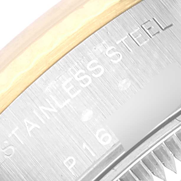 The image shows a close-up of the back case and edge markings of a Rolex Datejust 79173 Women's Steel and Gold (two tone) Beige Dial 79173 Women's Steel and Gold (two tone) Beige Dial model watch, highlighting the "STAINLESS STEEL" text.