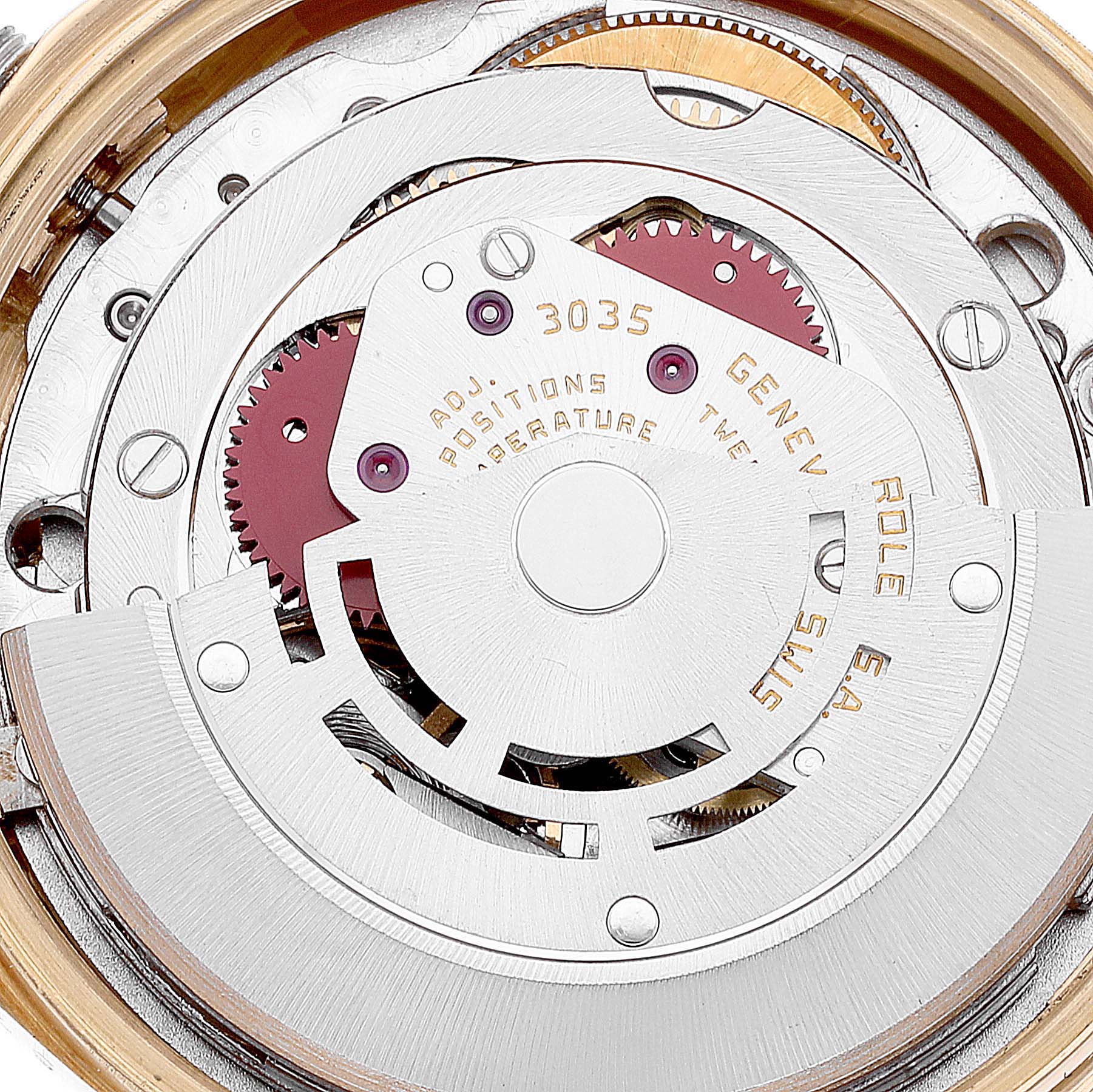 This image shows the intricate inner mechanical movement of the Rolex President 18078 Men's Yellow Gold Blue Dial 18078 Men's Yellow Gold Blue Dial model watch, including gears and inscriptions.