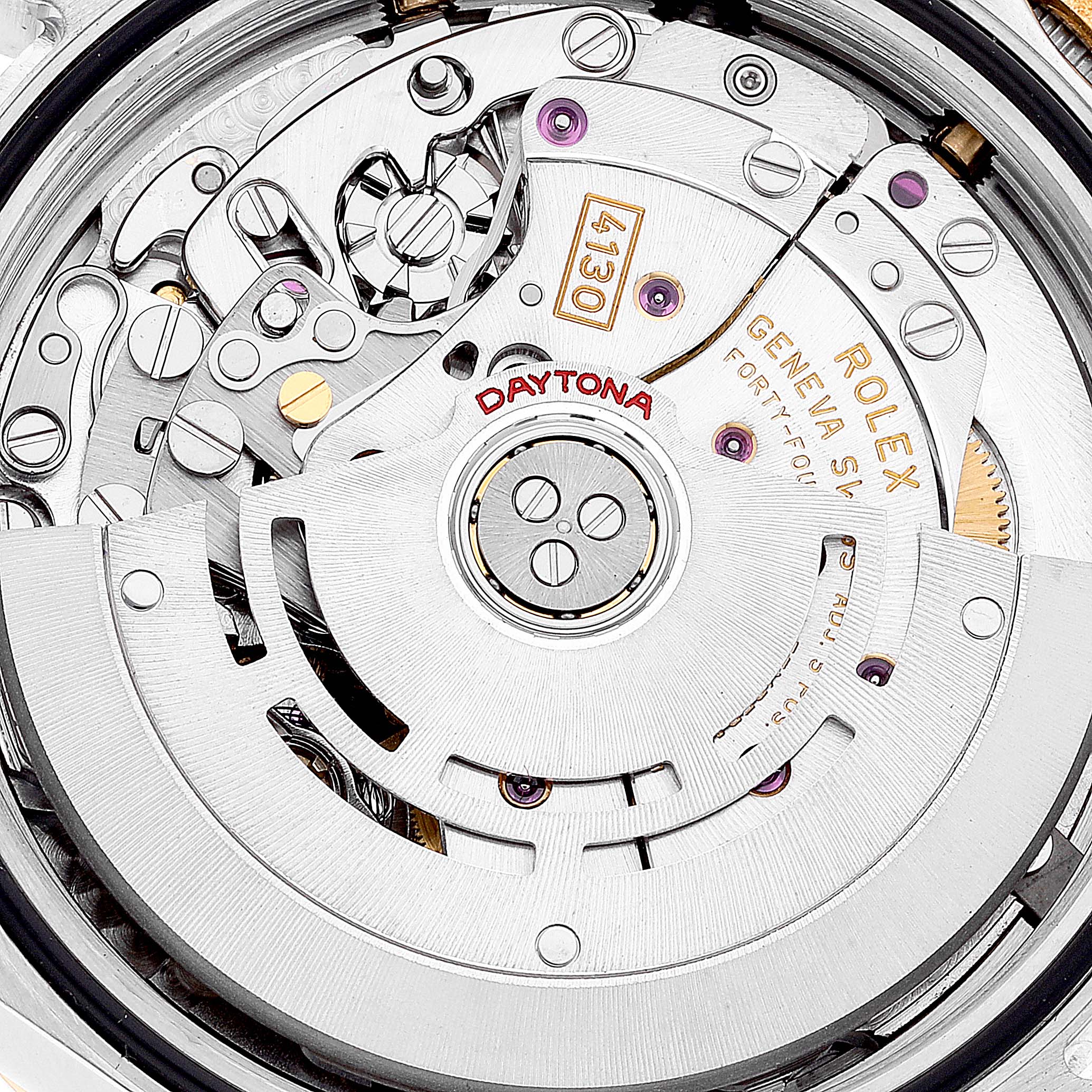 This image shows the intricate internal mechanism of a Rolex Daytona 116523 Men
s Steel and Gold (two tone) Black Dial 116523 Men
s Steel and Gold (two tone) Black Dial watch, highlighting the rotor and the engraved parts up close.