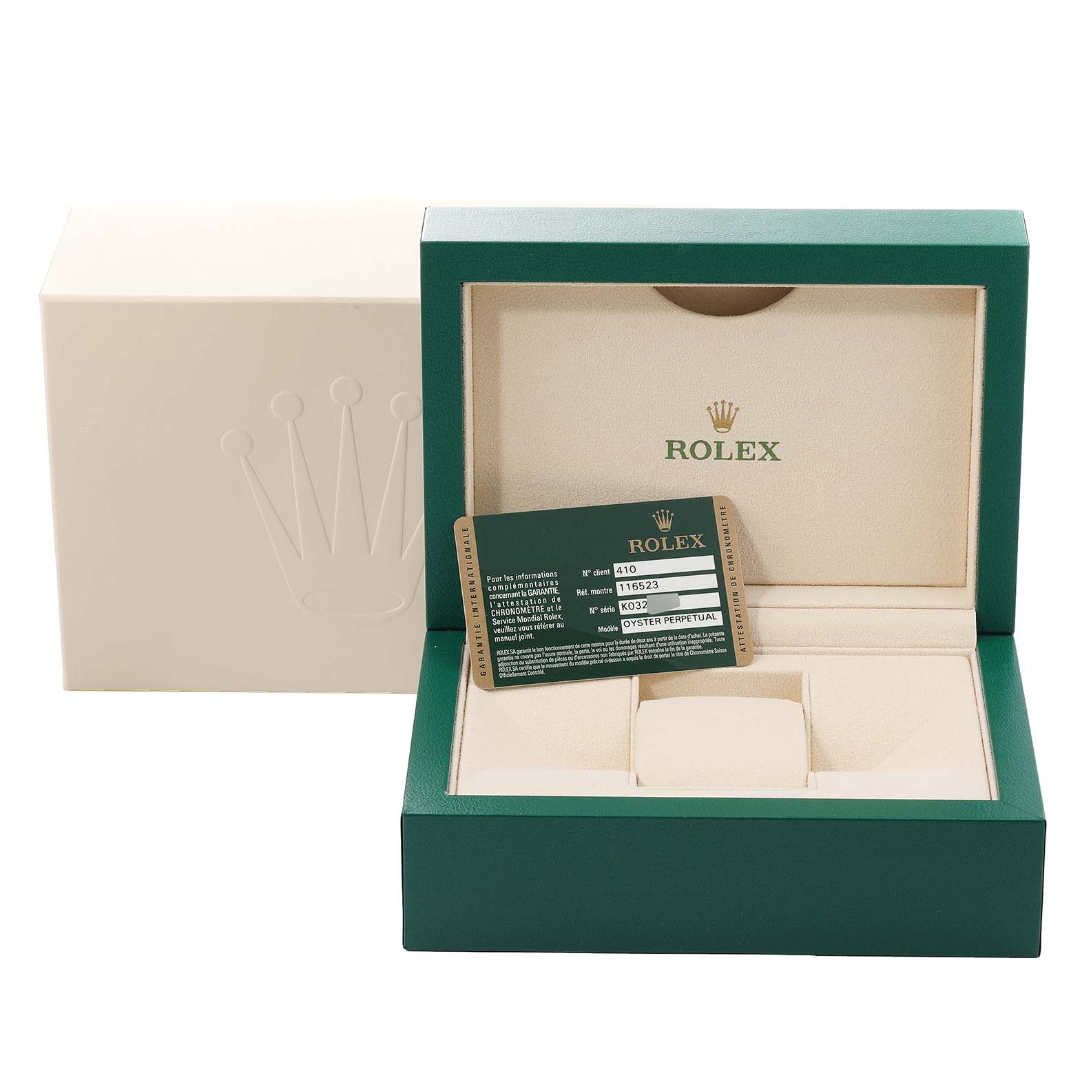 The image showcases the box and warranty card for a Rolex Daytona 116523 Men
s Steel and Gold (two tone) Black Dial 116523 Men
s Steel and Gold (two tone) Black Dial watch, including an interior green and beige padded display.