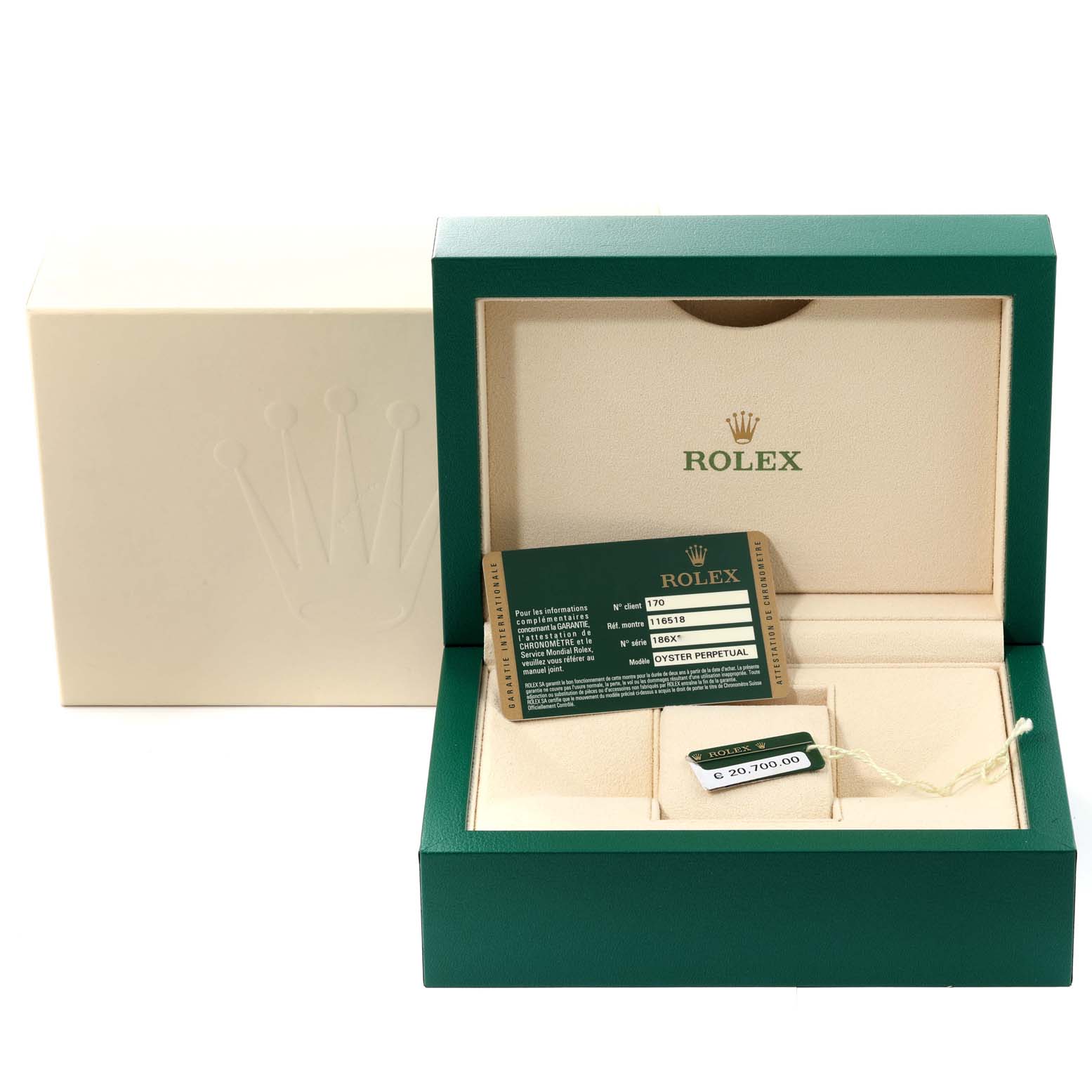 This image shows the packaging and certification card of a Rolex Daytona M116518-0080 Men's Yellow Gold Black Dial M116518-0080 Men's Yellow Gold Black Dial watch, with an open box and tags visible.