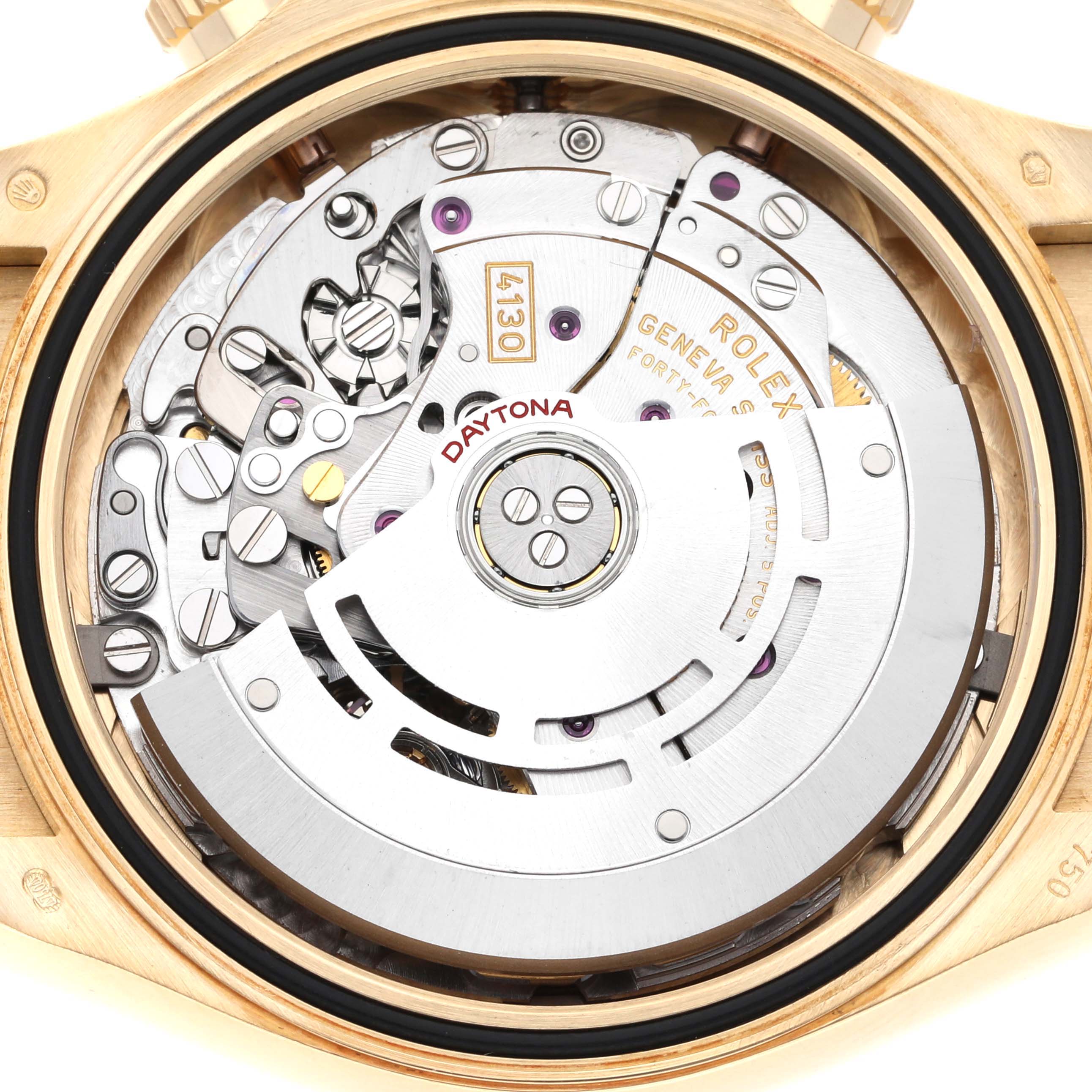 The image shows the back view of a Rolex Daytona M116518-0080 Men's Yellow Gold Black Dial M116518-0080 Men's Yellow Gold Black Dial watch mechanism, highlighting its intricate internal components.