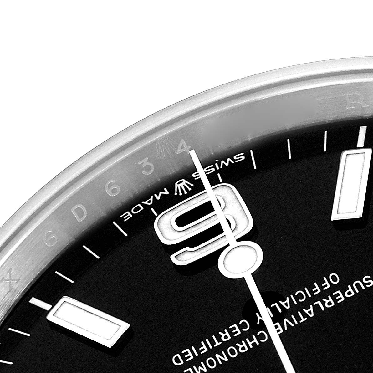 The image shows a close-up of the dial of a Rolex Explorer 224270 Men's Stainless Steel Black Dial 224270 Men's Stainless Steel Black Dial, focusing on the 3 and 9 markers, hands, and part of the text.