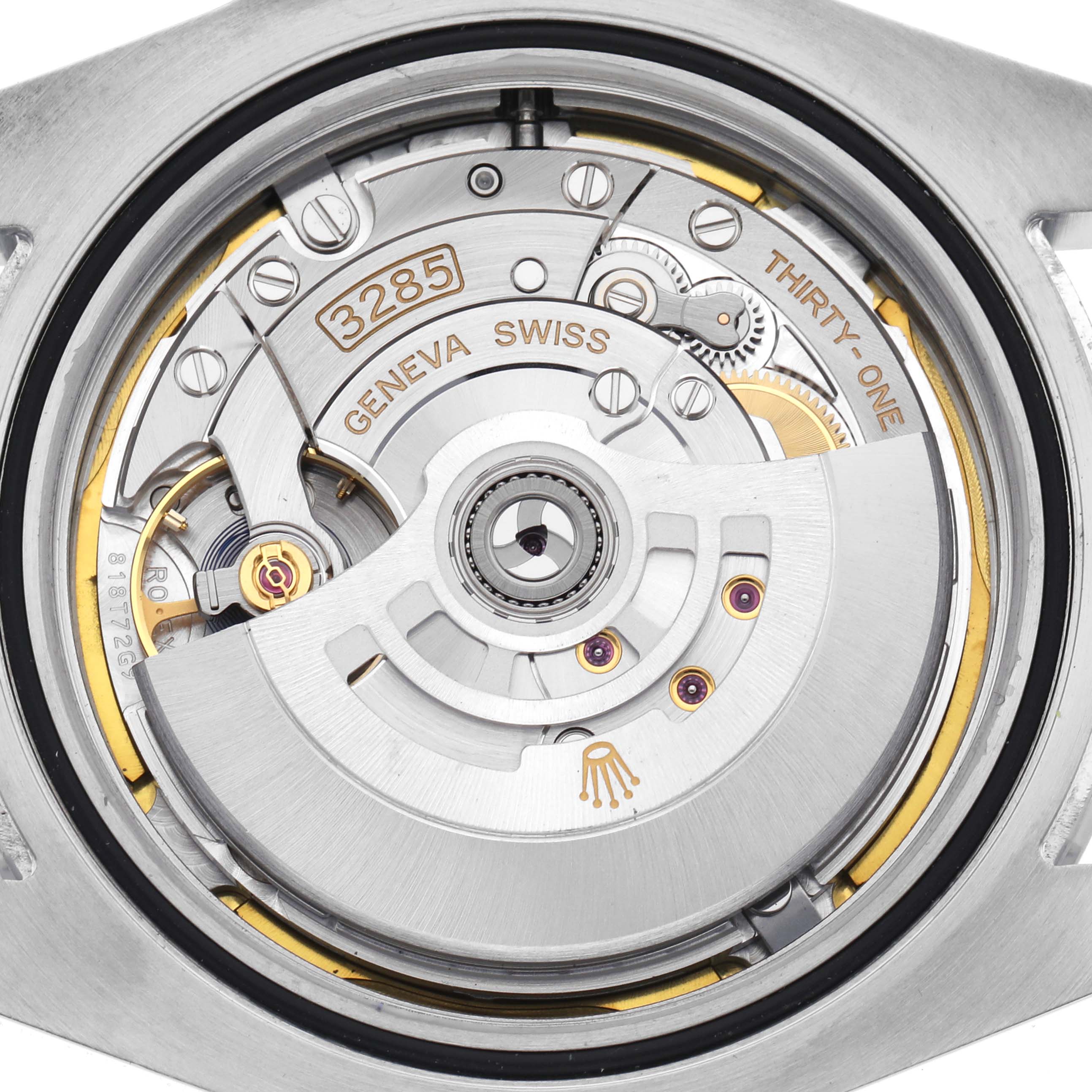 The image shows the movement of a Rolex Explorer 226570 Men's Stainless Steel White Dial 226570 Men's Stainless Steel White Dial watch from the back, highlighting the rotor and intricate mechanisms.