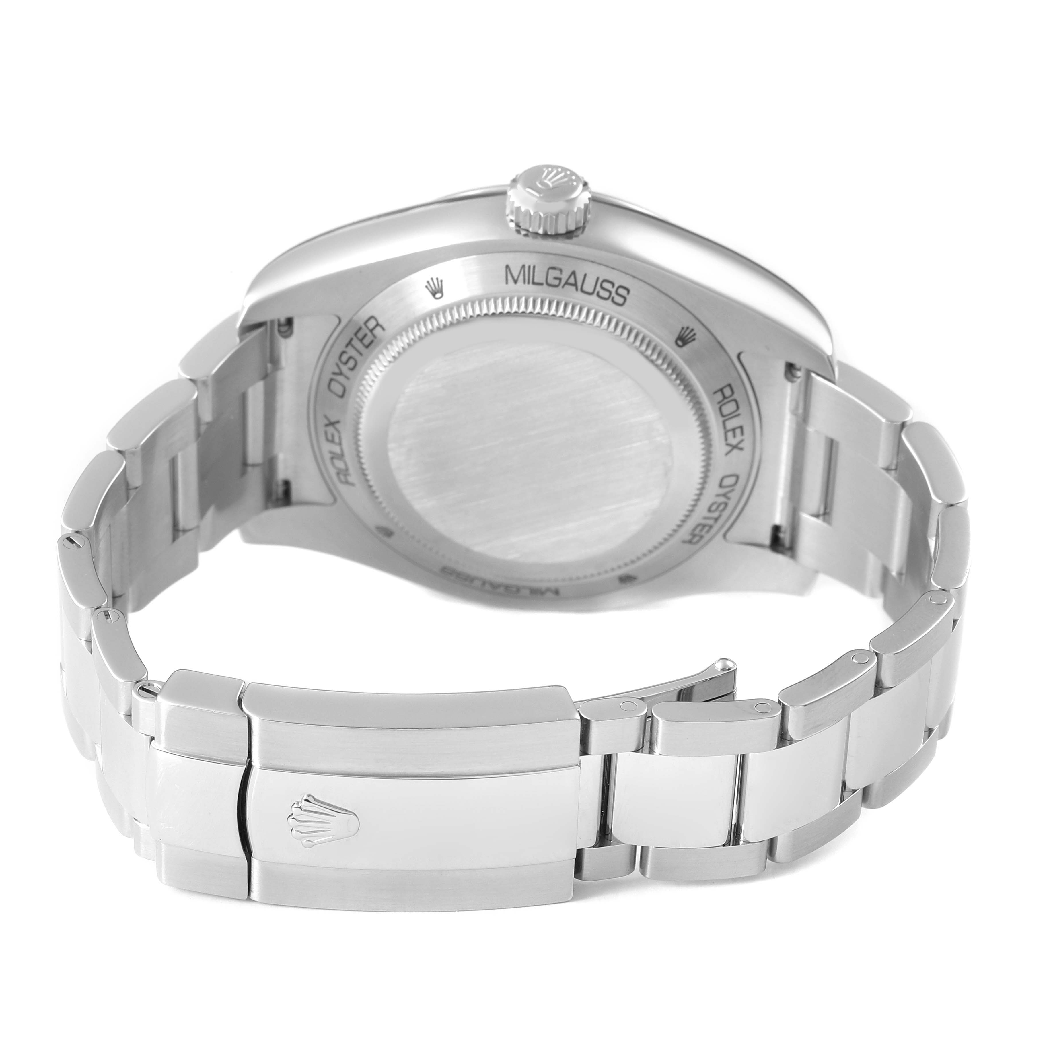 The image shows the back case, bracelet, and clasp of a Rolex Milgauss M116400GV-0001 Men's Stainless Steel Black Dial watch from a rear angle.